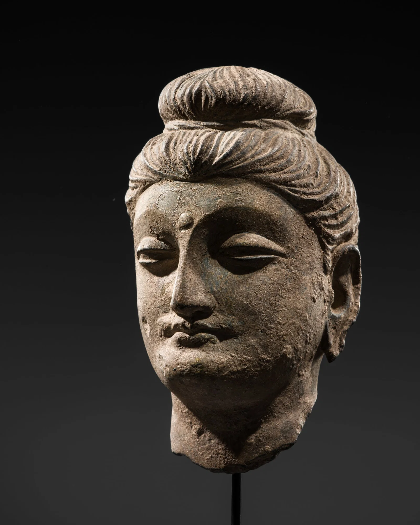 A GRAY SCHIST HEAD OF BUDDHA, ANCIENT REGION OF GANDHARA, 3RD-4TH CENTURY