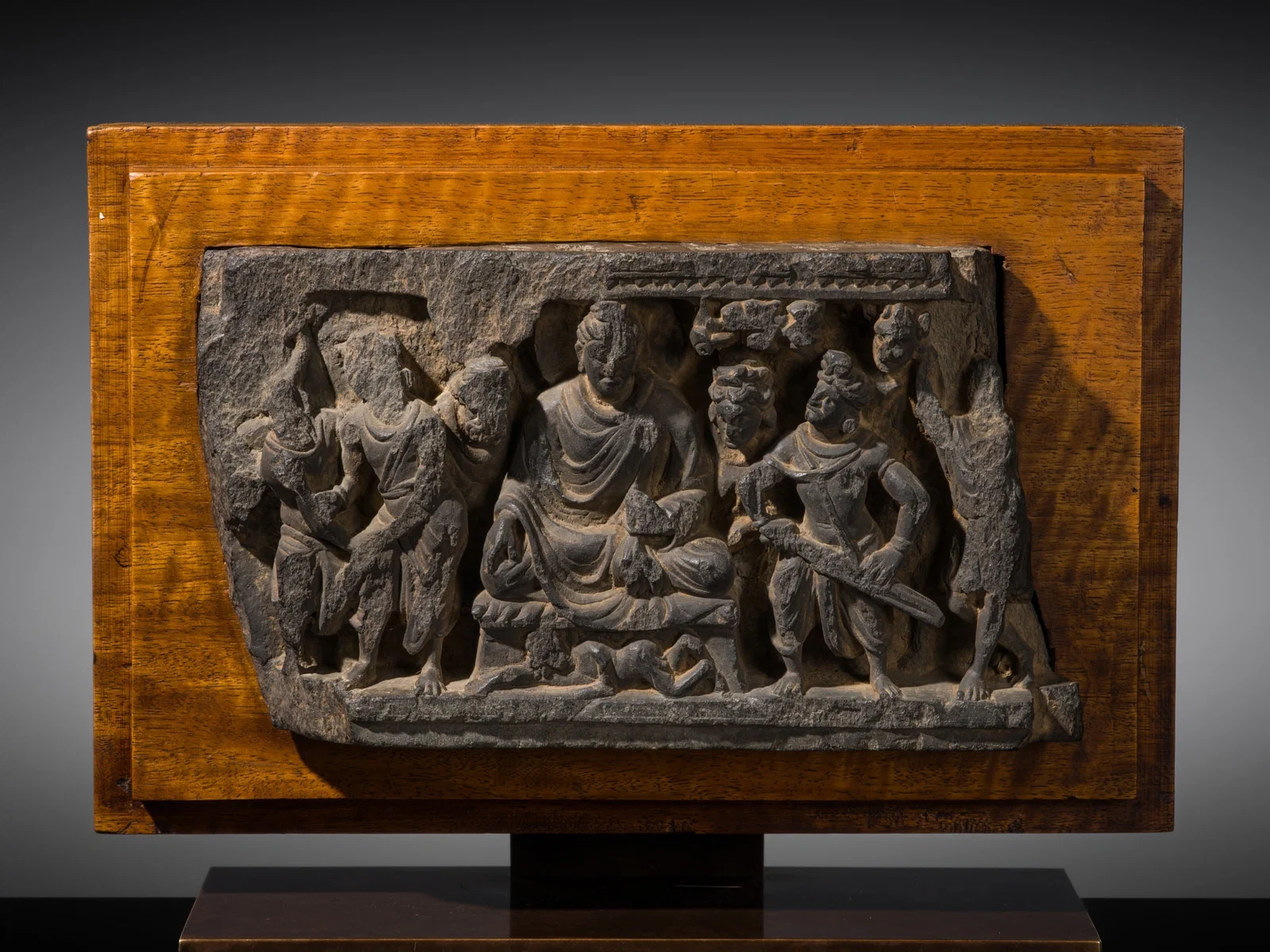 A GRAY SCHIST NARRATIVE PANEL DEPICTING TWO SCENES FROM THE ASSAULT OF MARA, ANCIENT REGION OF