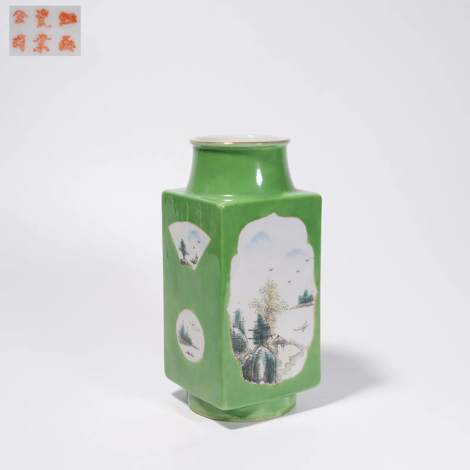 A GREEN-GLAZED OPENWORK FAMILLE ROSE LANDSCAPE SQUARE VASE