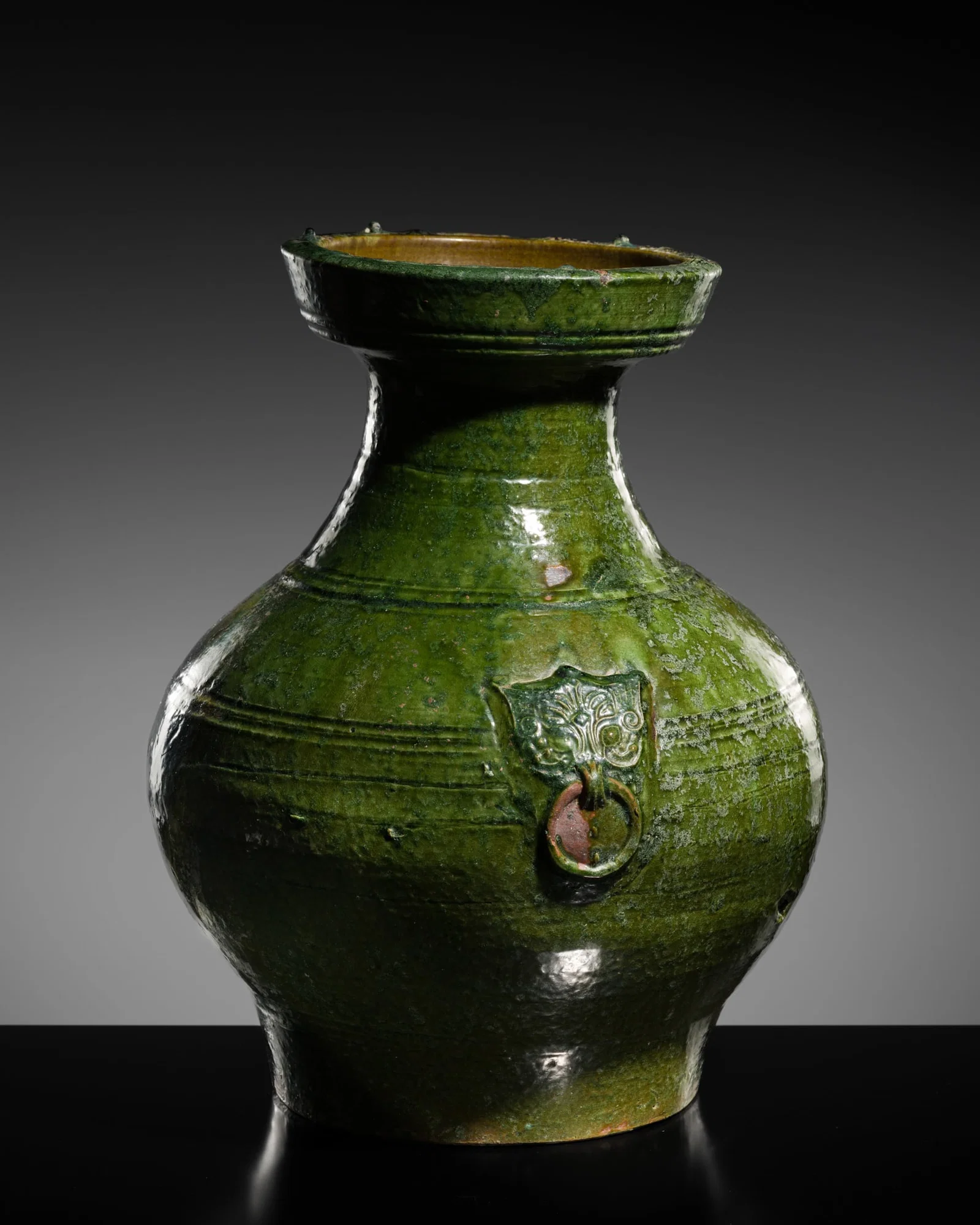 A GREEN-GLAZED RED POTTERY JAR, HU, HAN DYNASTY