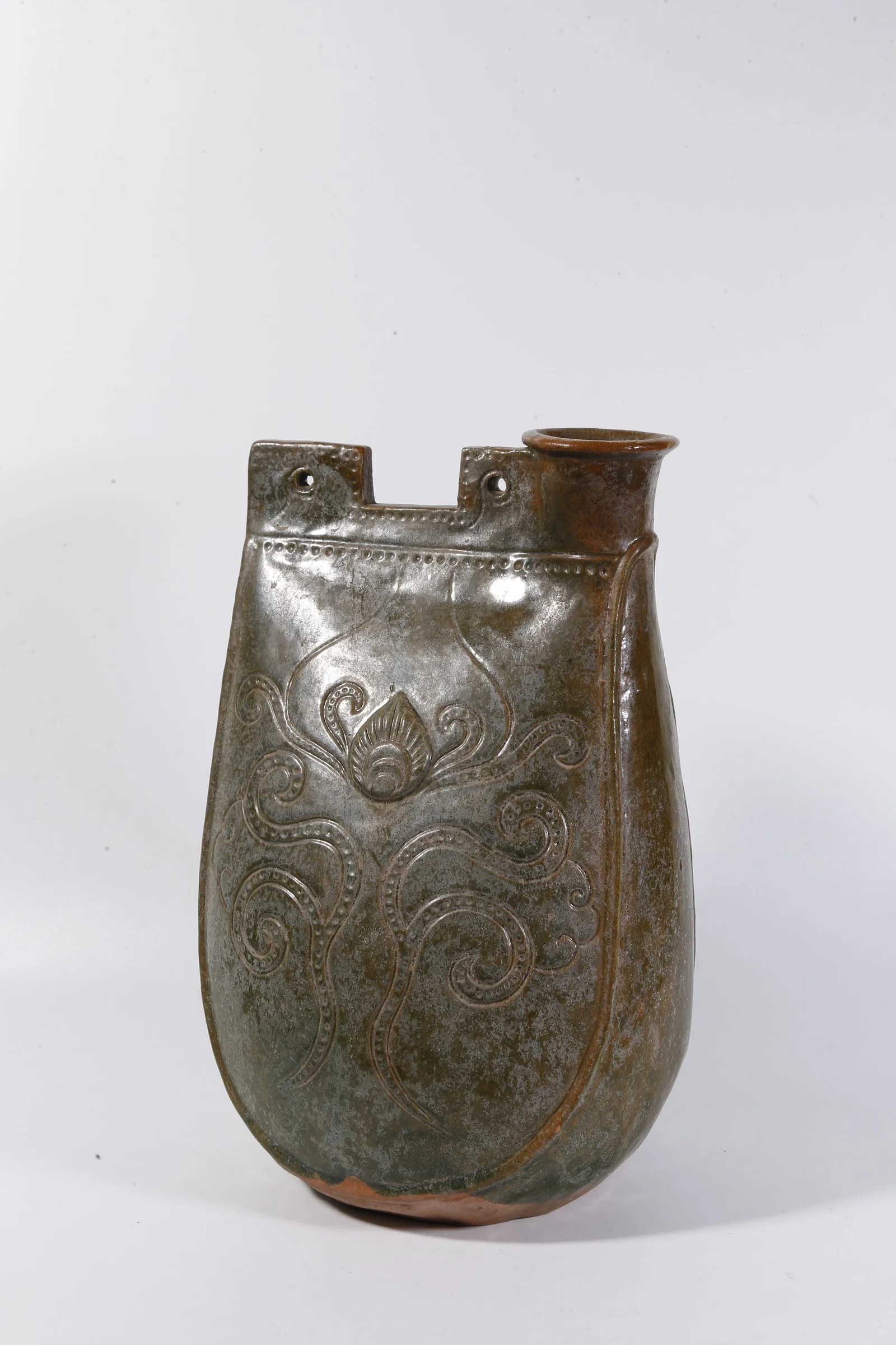 A GREEN-GLAZED "SKIN-BAG" FLASK