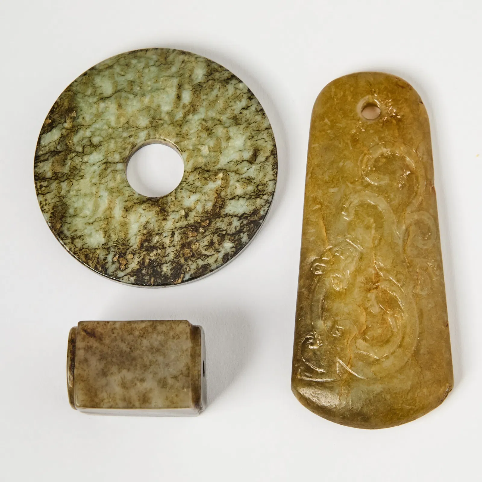 A Group of Chinese Archaistic Jade Articles Ming Dynasty or earlier