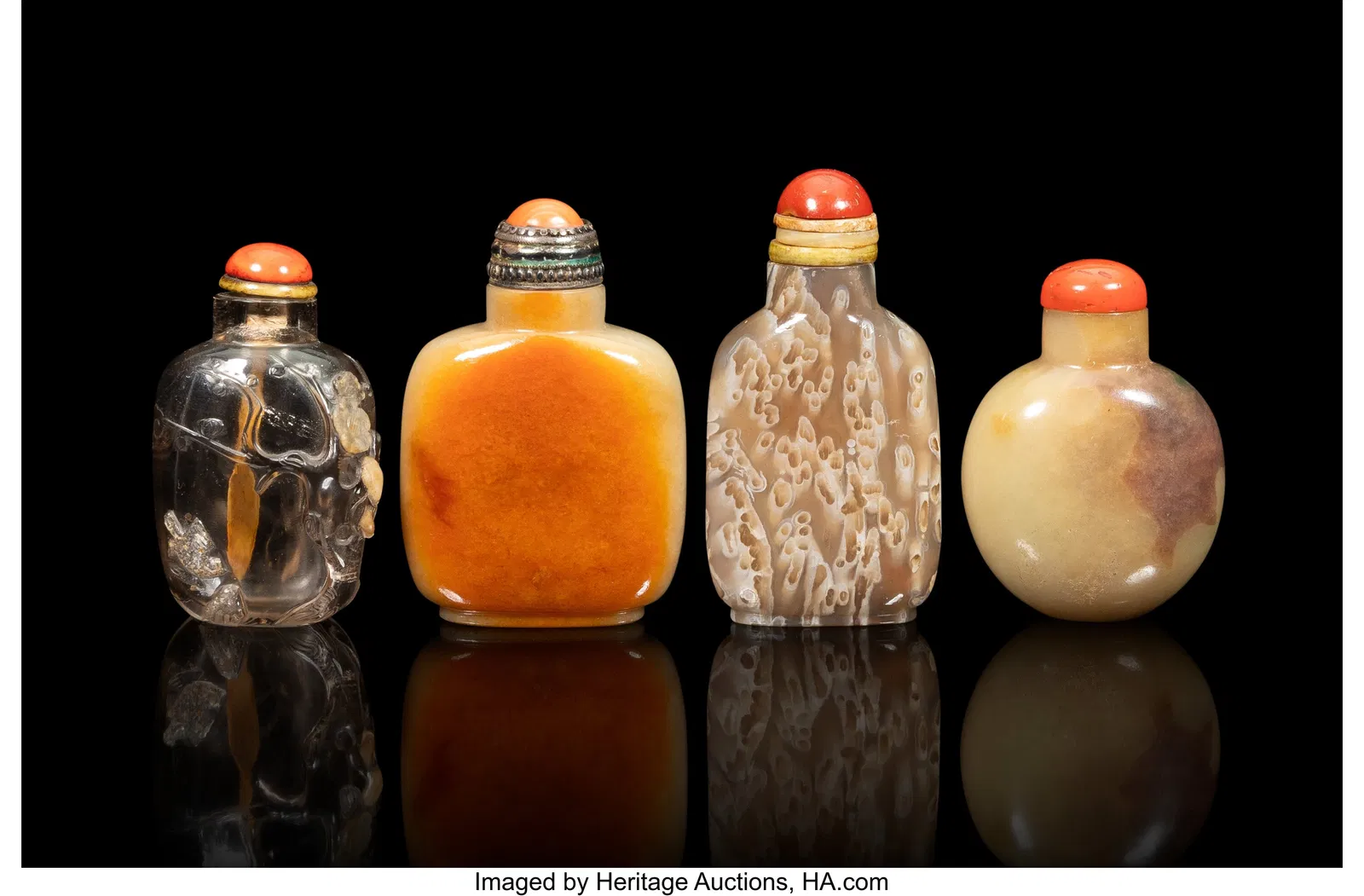 A Group of Four Chinese Hardstone Snuff Bottles,