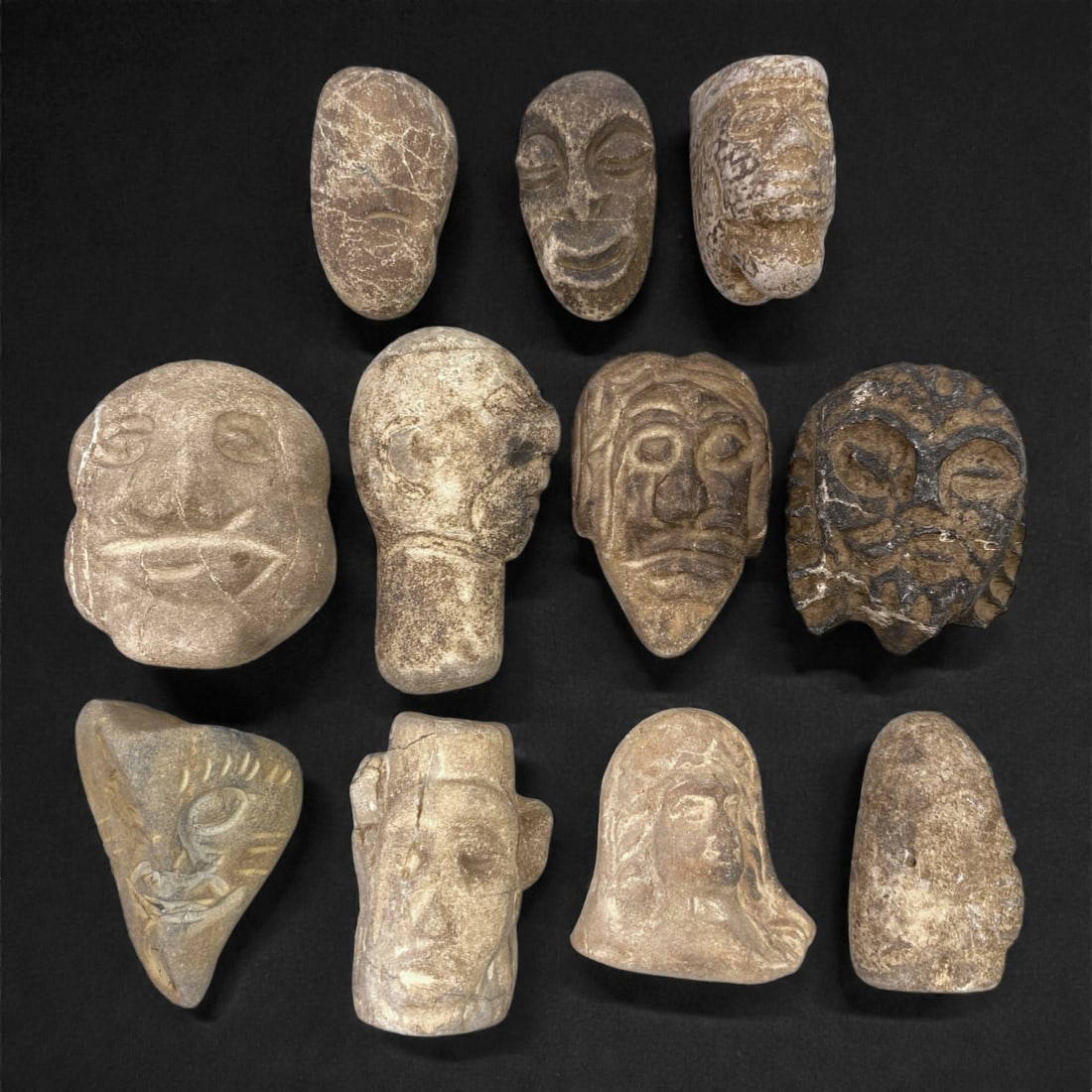 A Group of Near Eastern Stone Maskettes, Ancient Period, 70XJ