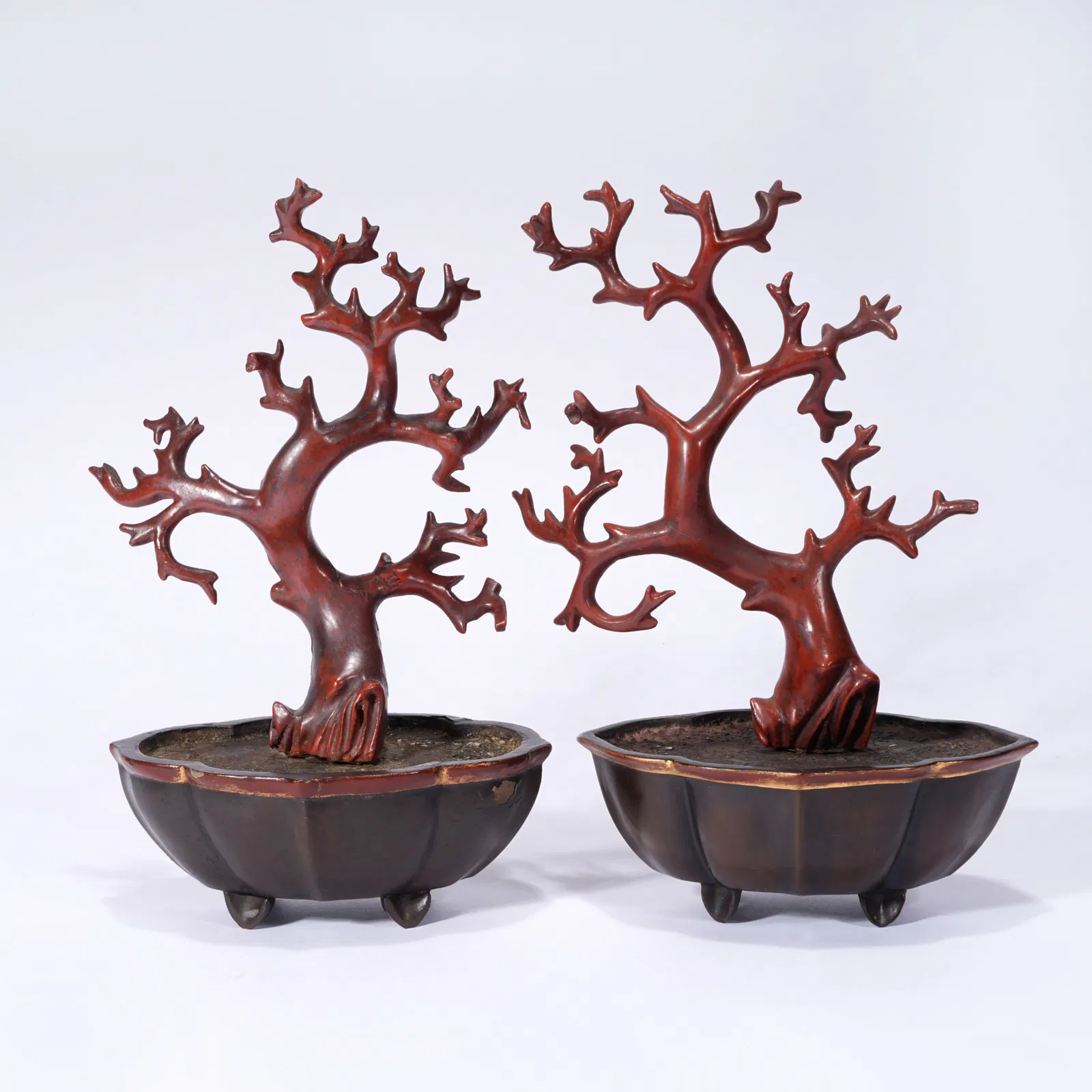 A GROUP OF RED-LACQUER BONSAI ORNAMENTS