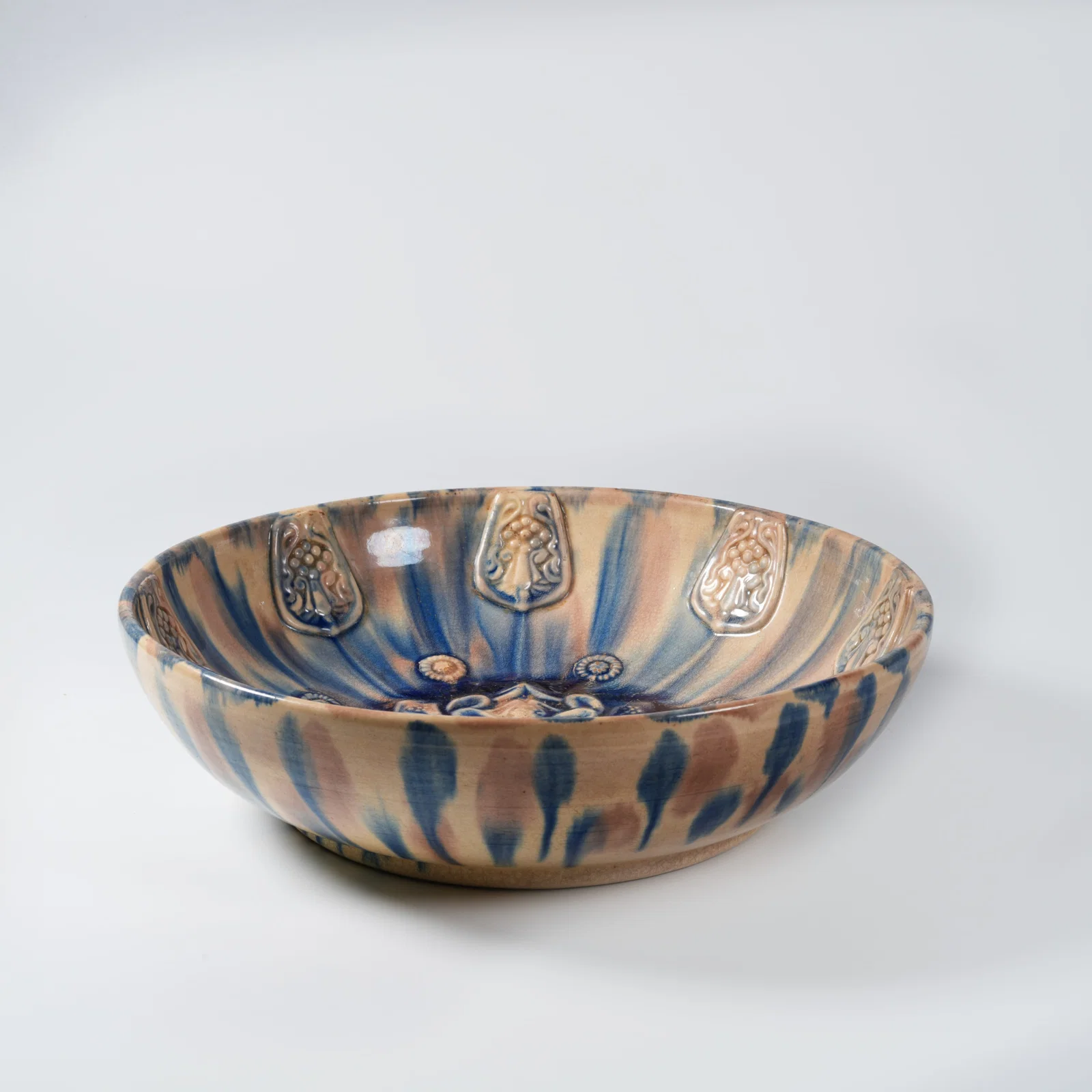 A HANGING-BLUE SANCAI-GLAZED BOWL