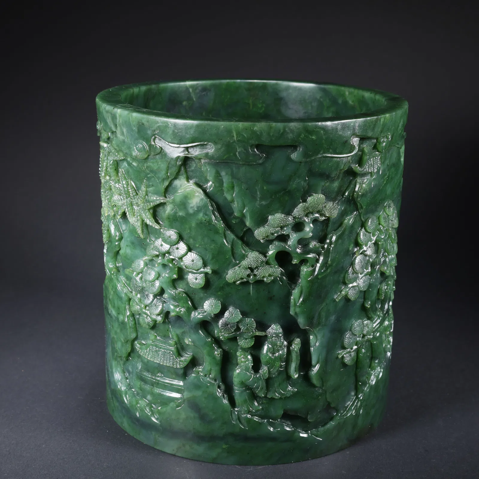 A HETIAN GREEN JADE BRUSH HOLDER WITH LANDSCAPE AND FIGURES