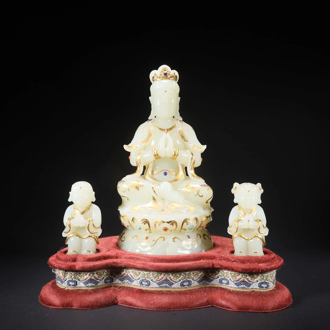 A HETIAN JADE BOY PAYING HOMAGE TO GUANYIN INLAID WITH GOLD AND GEMSTONES