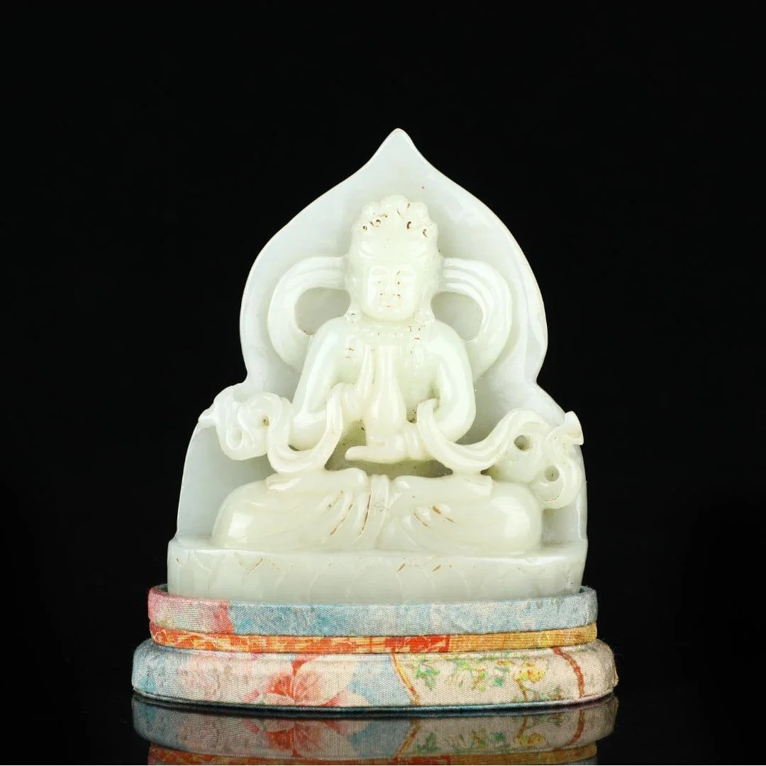 A Hetian jade Buddha statue from the Qing Dynasty