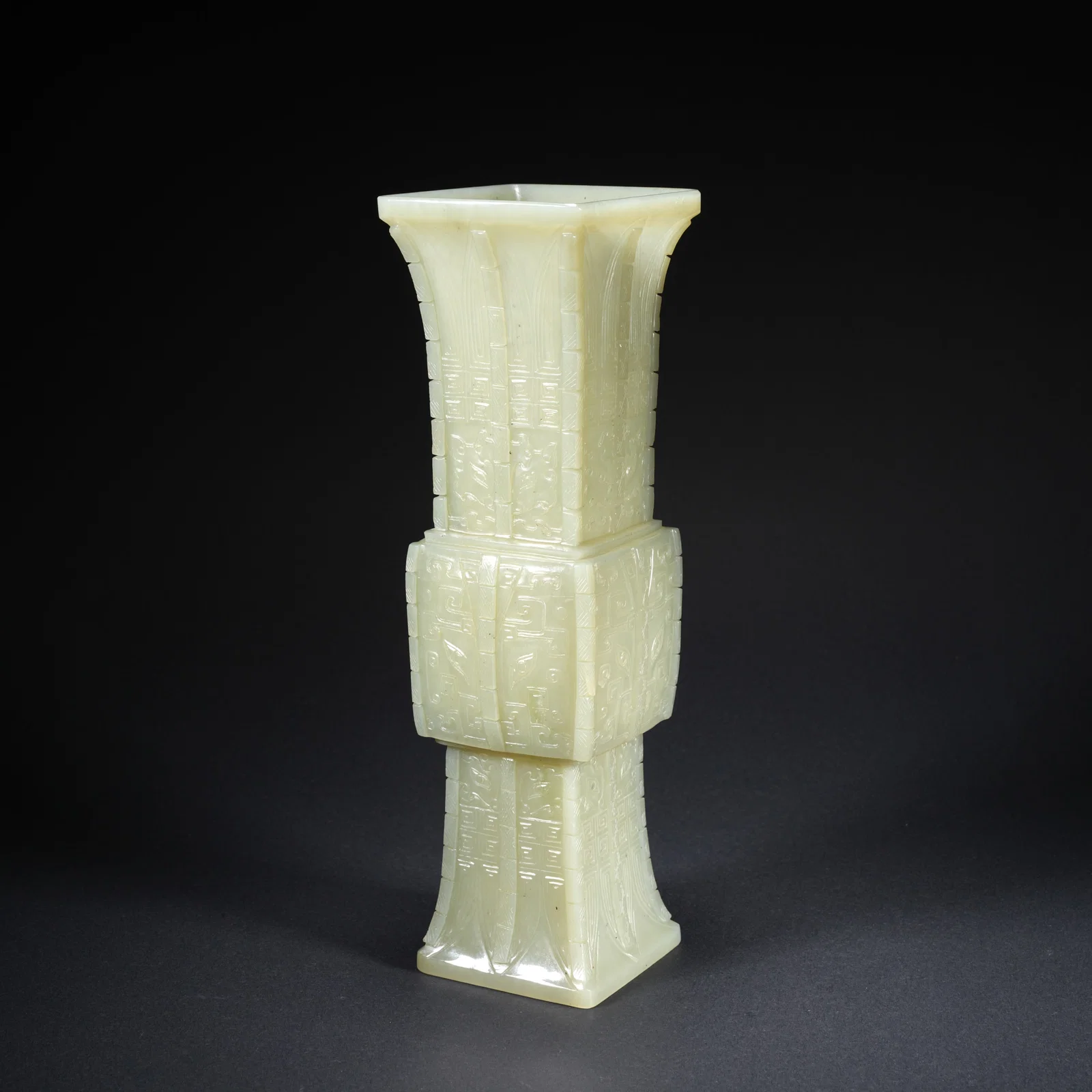 A HETIAN JADE CARVED BEAST-MASK GU VASE