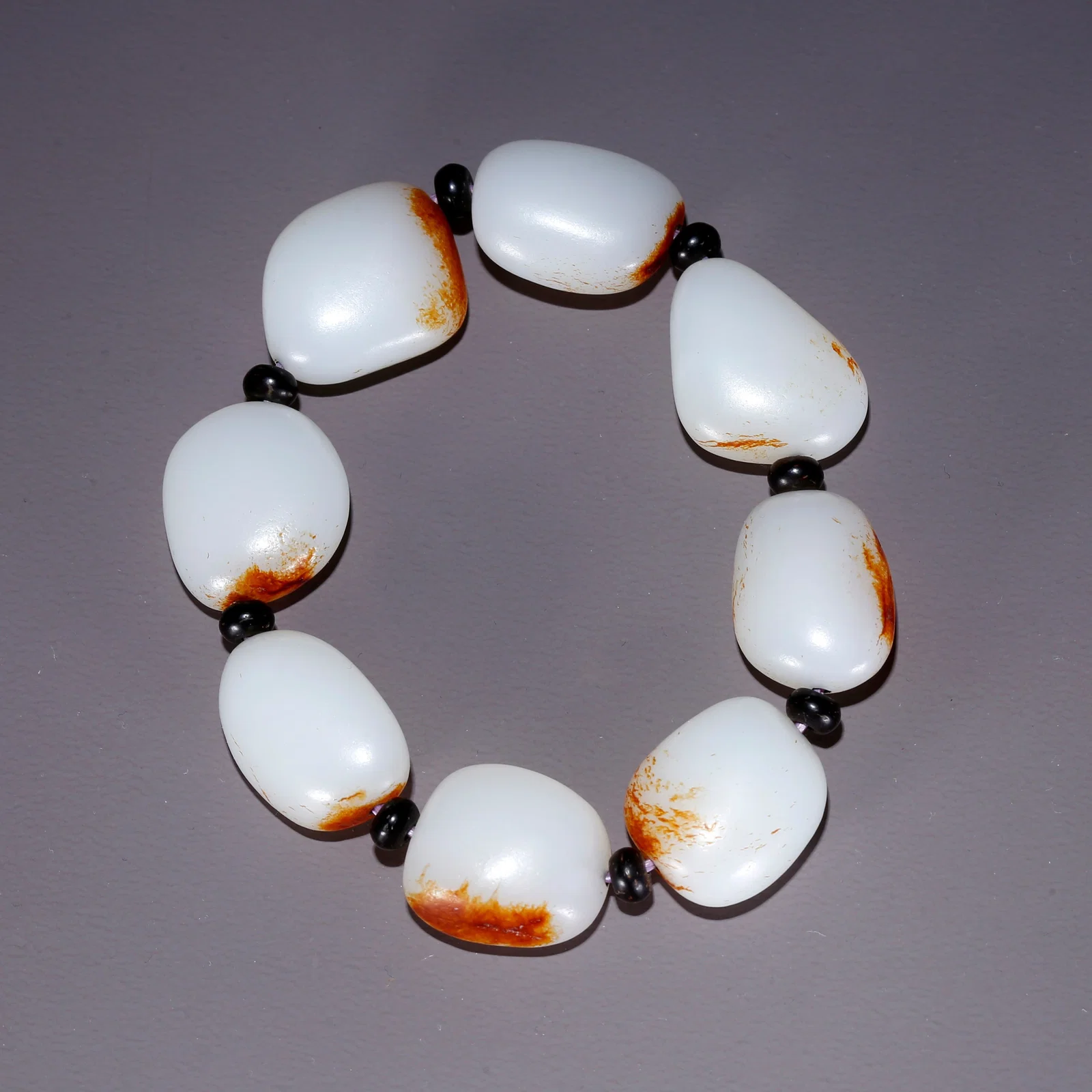 A HETIAN JADE CARVED BRACELET