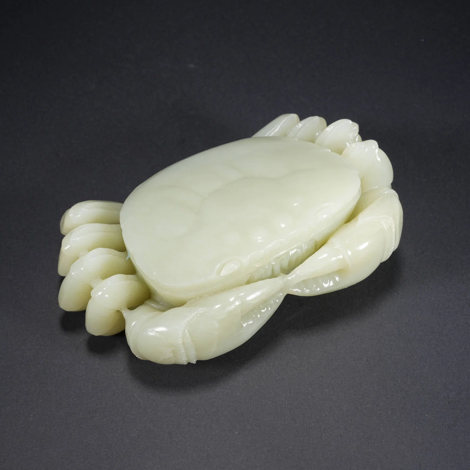 A HETIAN JADE CARVED CRAB-FORM FIGURE
