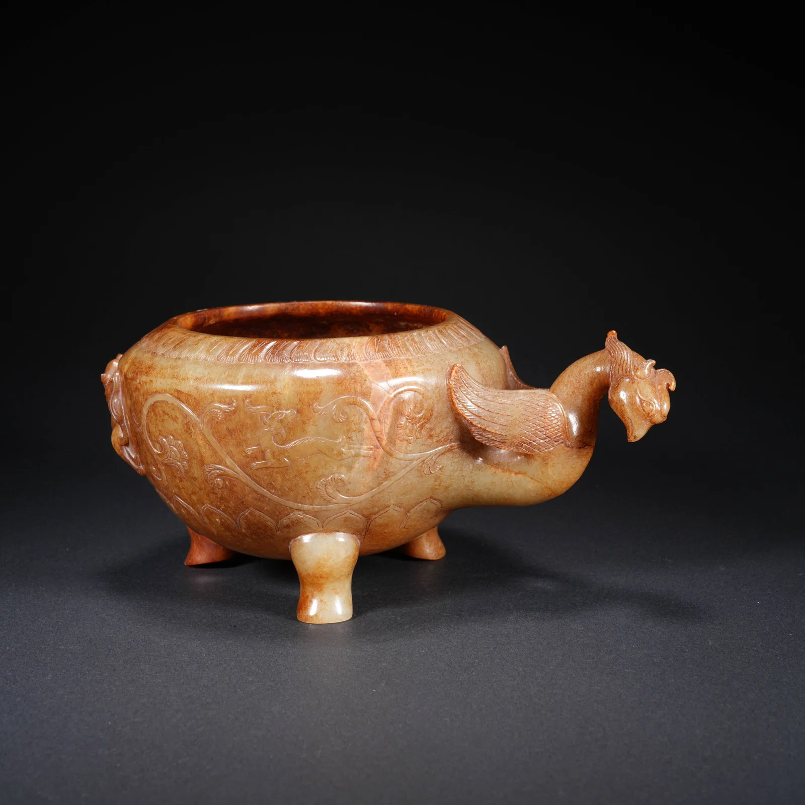 A HETIAN JADE CARVED PHOENIX-MOTIF JAR