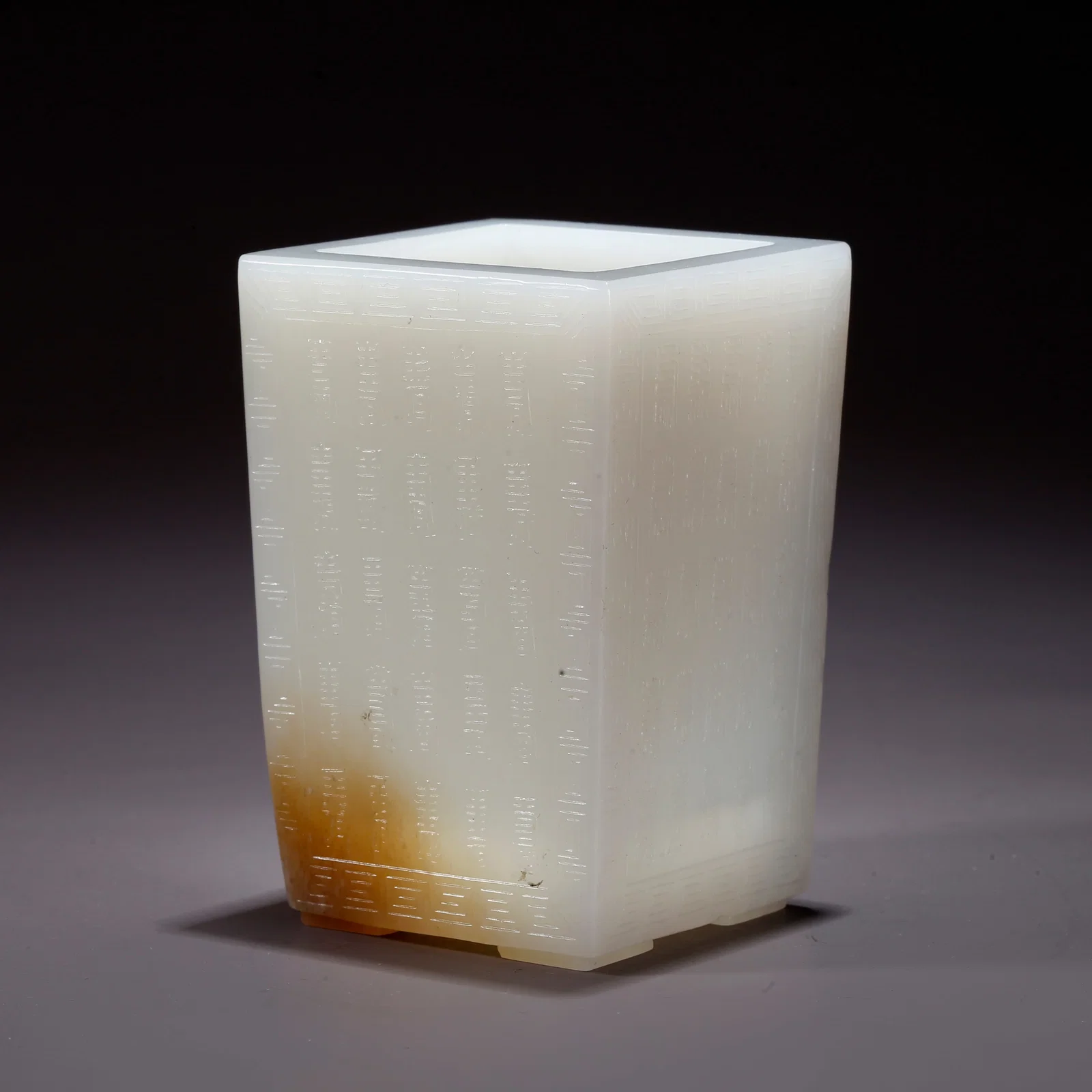 A HETIAN JADE CARVED POEM BRUSH HOLDER