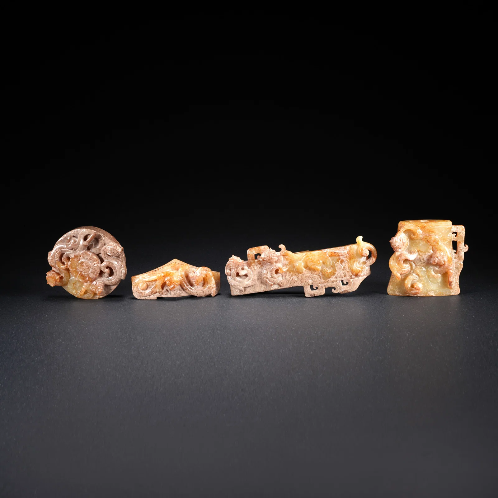 A HETIAN JADE CARVED SWORD ORNAMENT (SET)