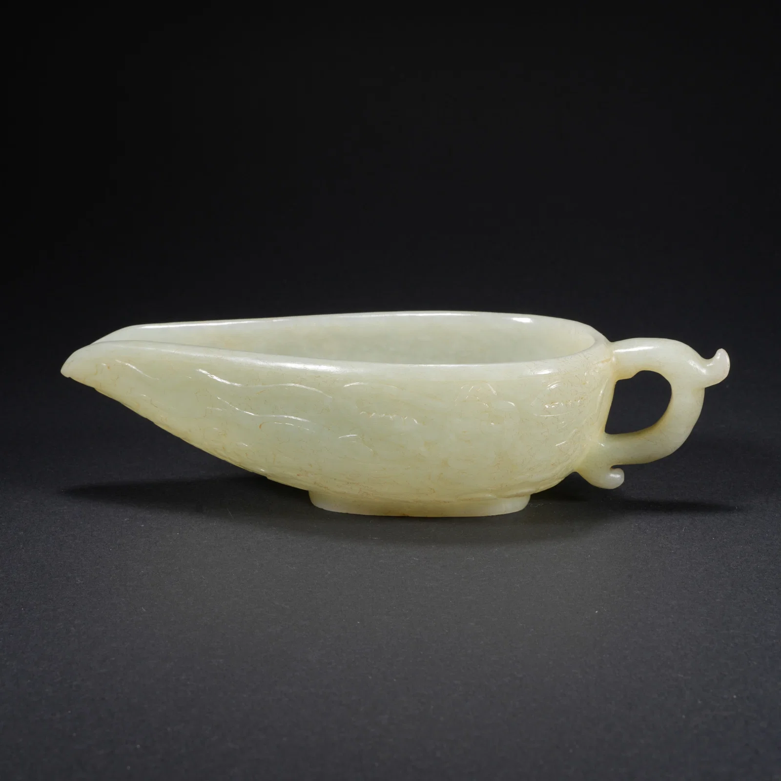 A HETIAN JADE CARVED WASH BASIN WITH FLYING APSARA MOTIF