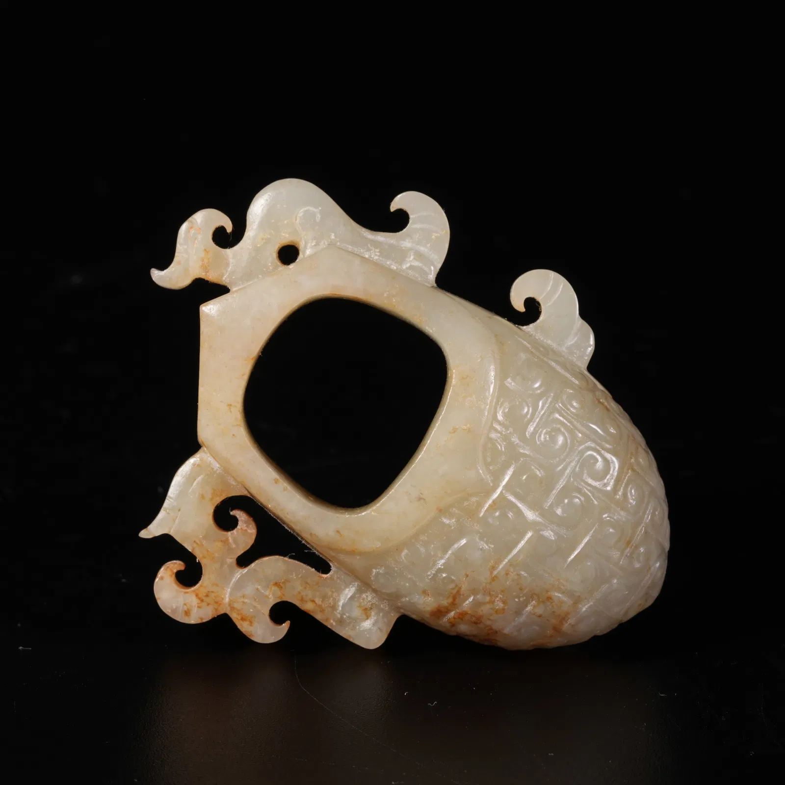 A HETIAN JADE CHICKEN-HEART PENDANT