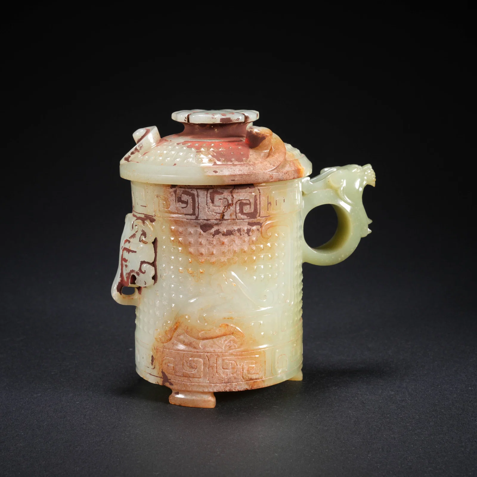 A HETIAN JADE COVERED JAR WITH BEAST-FACE AND PHOENIX DESIGN