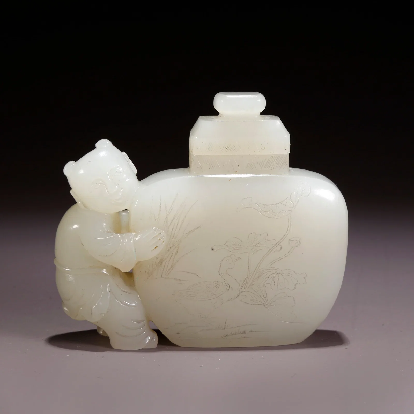 A HETIAN JADE COVERED VASE WITH BOY MOTIF