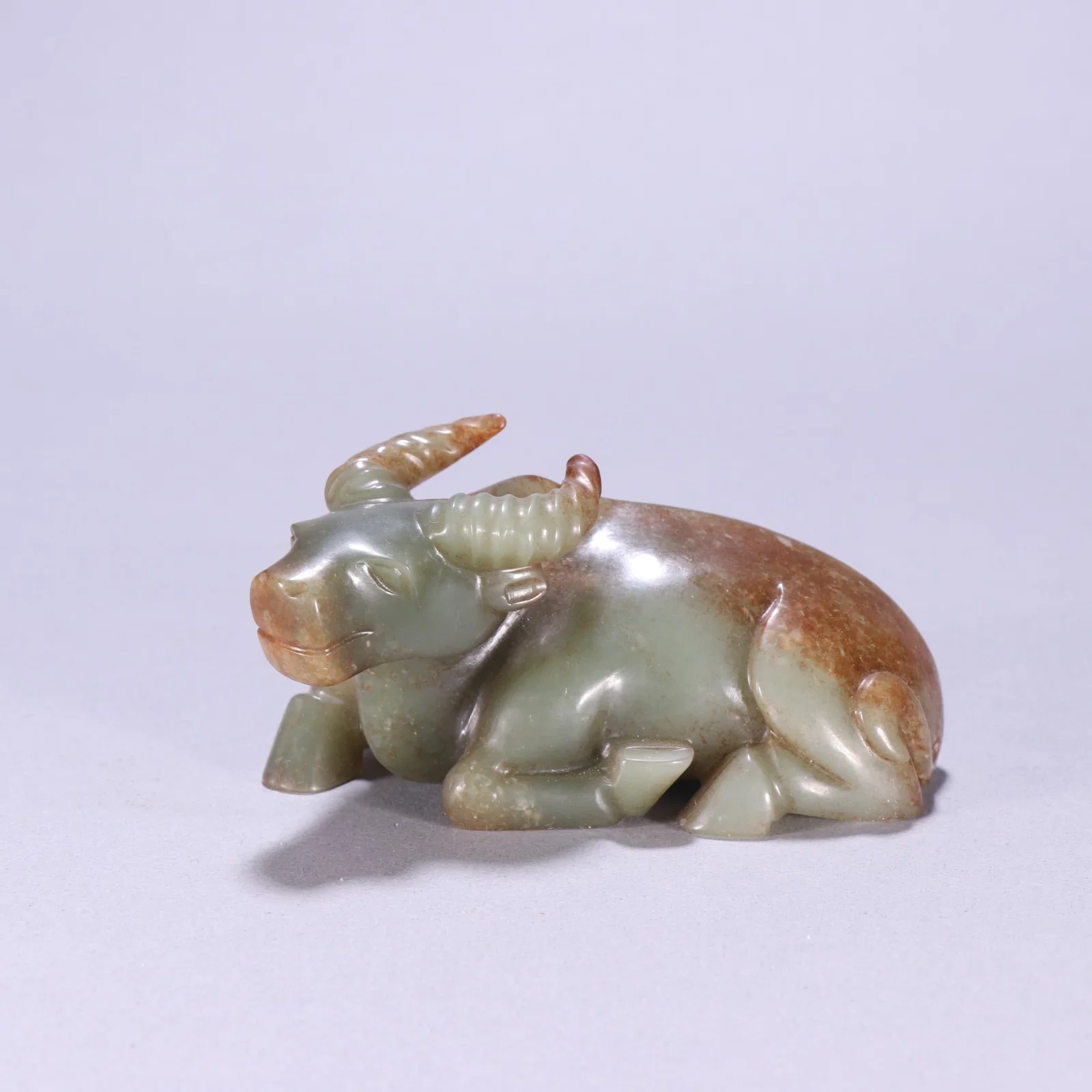 A Hetian jade cow ornament from the Qing Dynasty