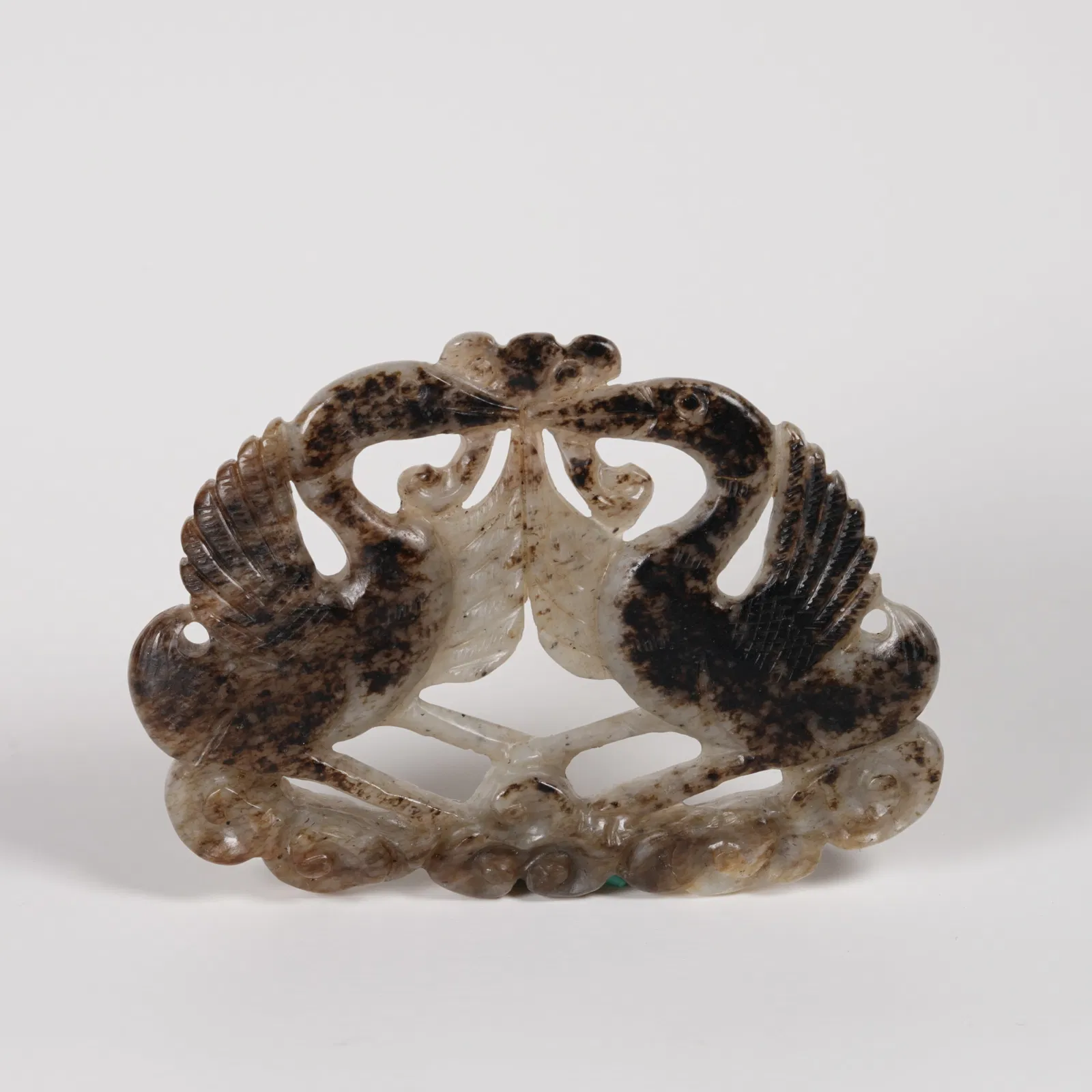 A HETIAN JADE DOUBLE-BIRD PENDANT