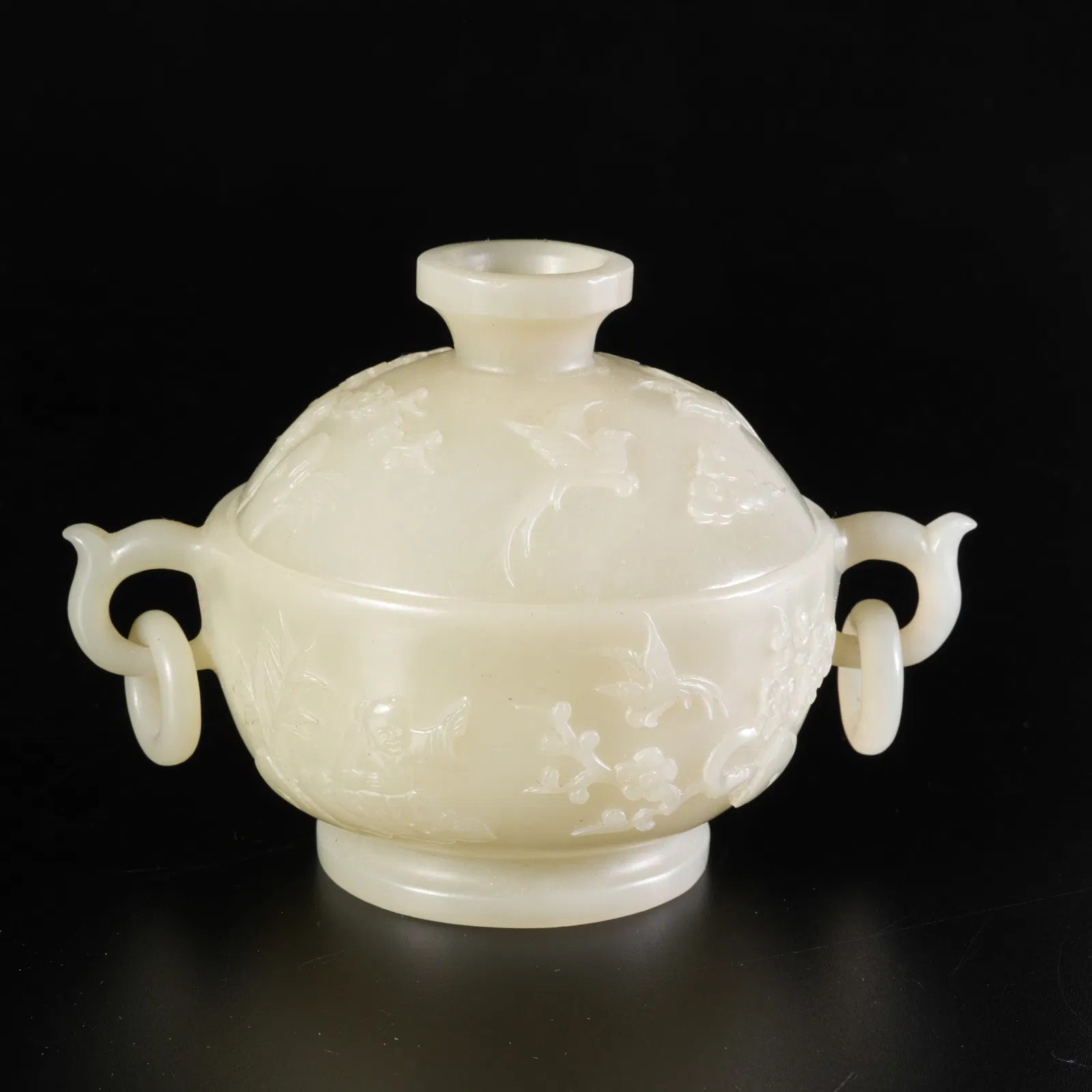 A HETIAN JADE DOUBLE-HANDLED INCENSE BURNER WITH BOY MOTIF