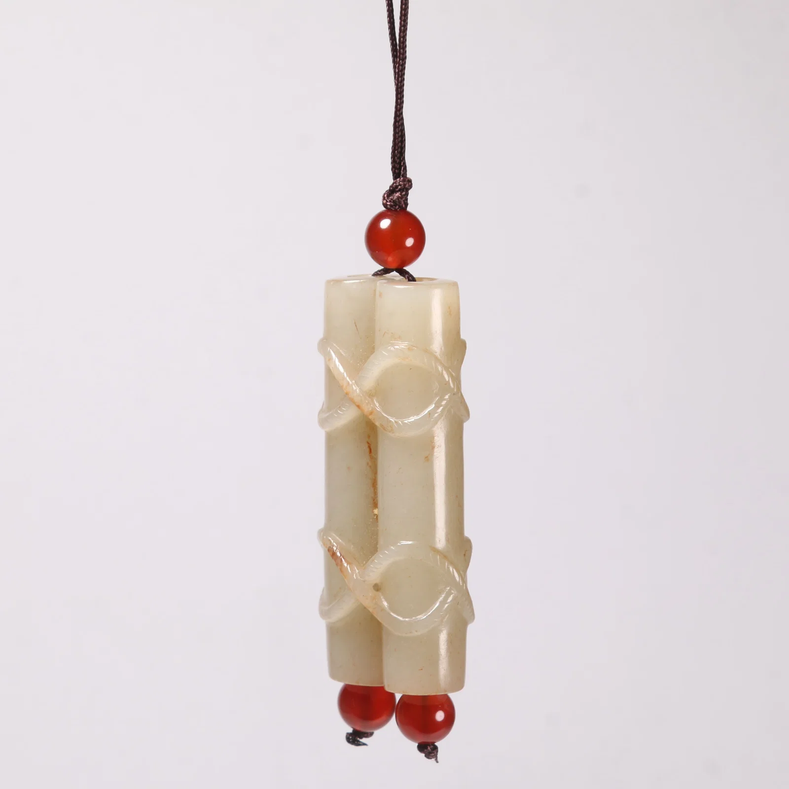 A HETIAN JADE DOUBLE-TUBE ORNAMENT