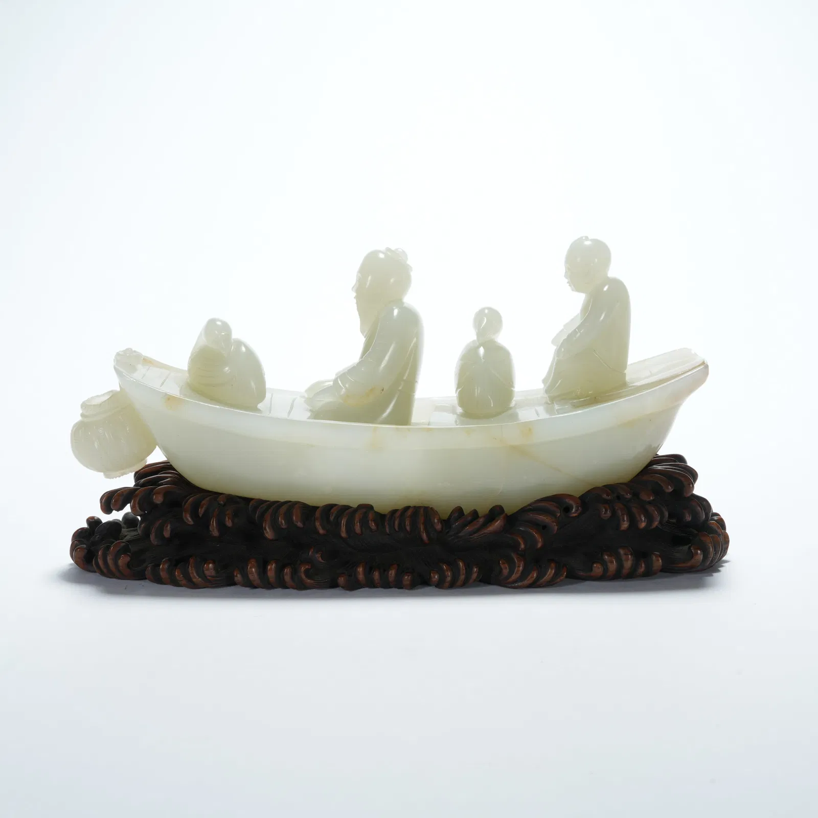 A HETIAN JADE FIGURATIVE BOAT ORNAMENT