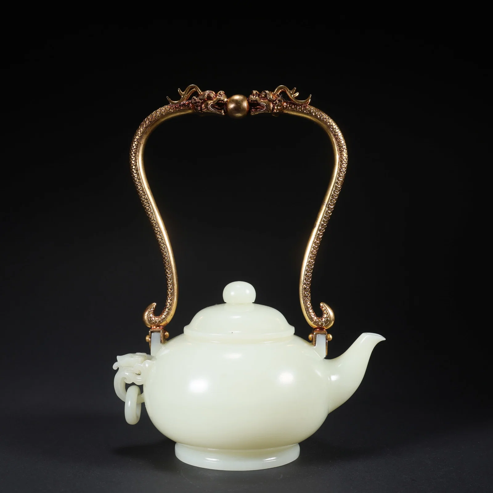 A HETIAN JADE GILT-BRONZE TWO-DRAGON CHASING PEARL HANDLED TEAPOT