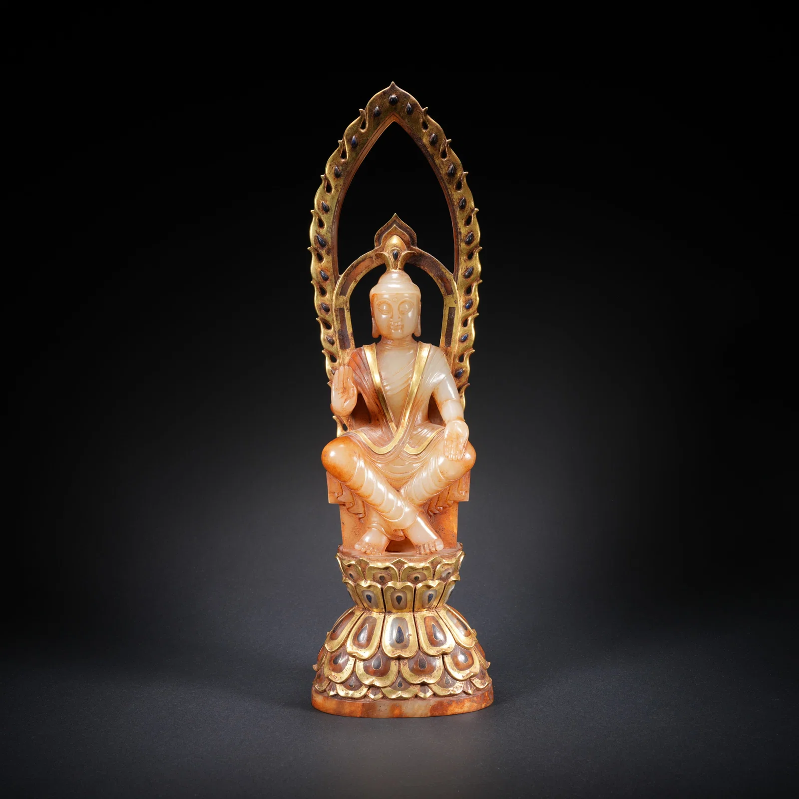 A HETIAN JADE GILT BUDDHA FIGURE
