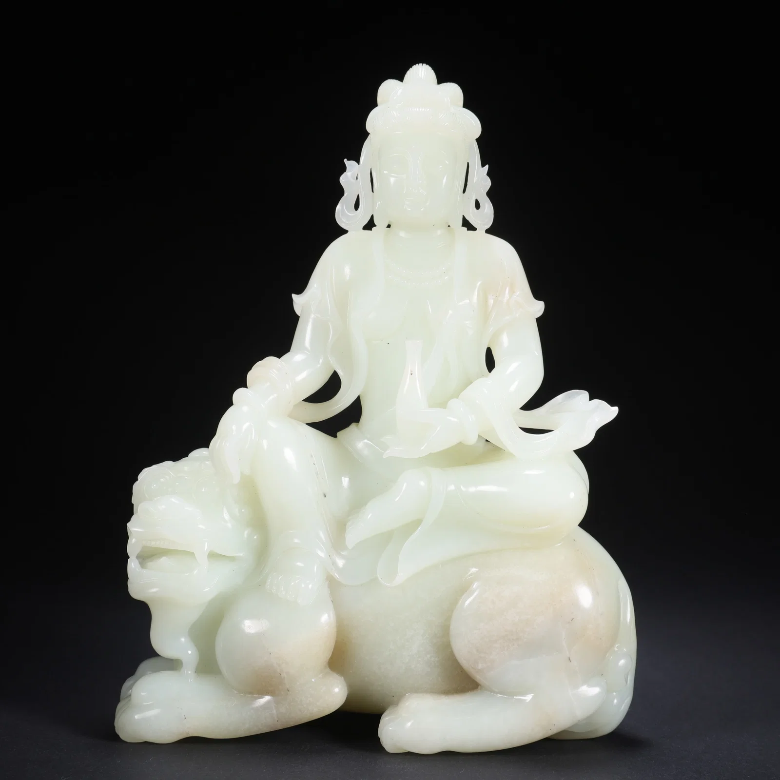A HETIAN JADE GUANYIN RIDING LION BOTTLE