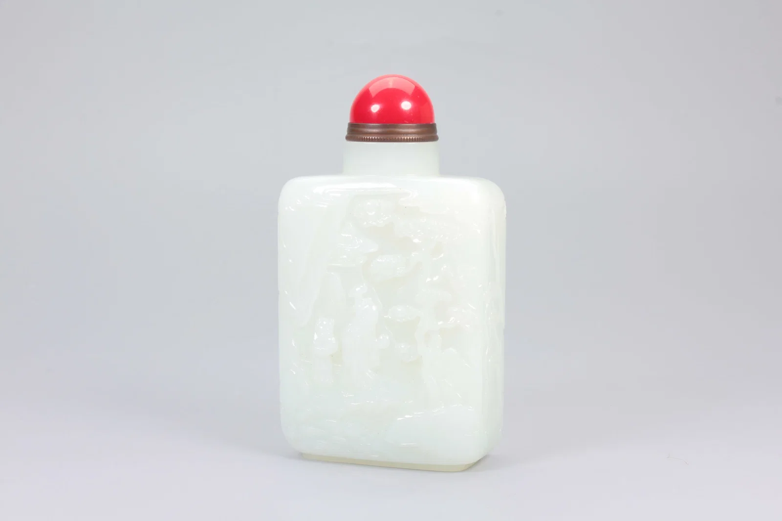 A HETIAN JADE LONGEVITY DEITY STORY SNUFF BOTTLE