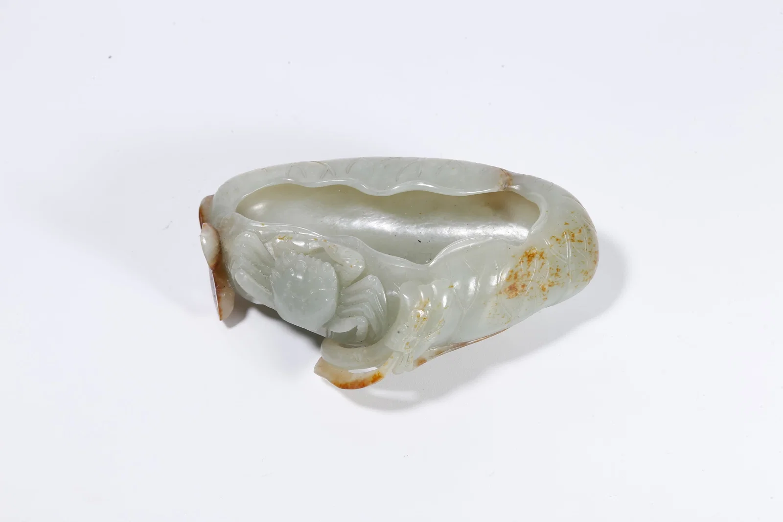 A HETIAN JADE LOTUS-LEAF SHAPED WATER BASIN