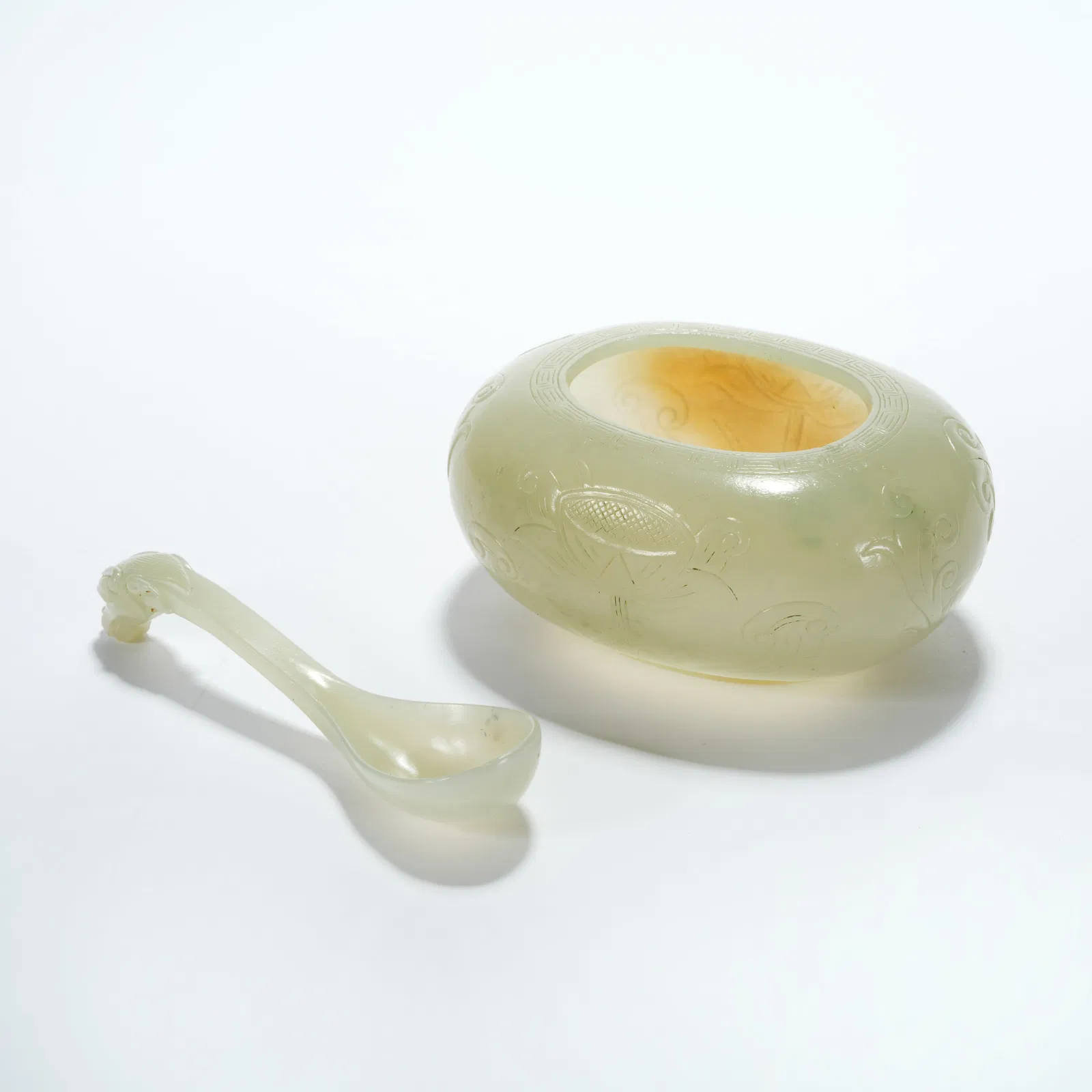 A HETIAN JADE LOTUS-PATTERN WATER CONTAINER