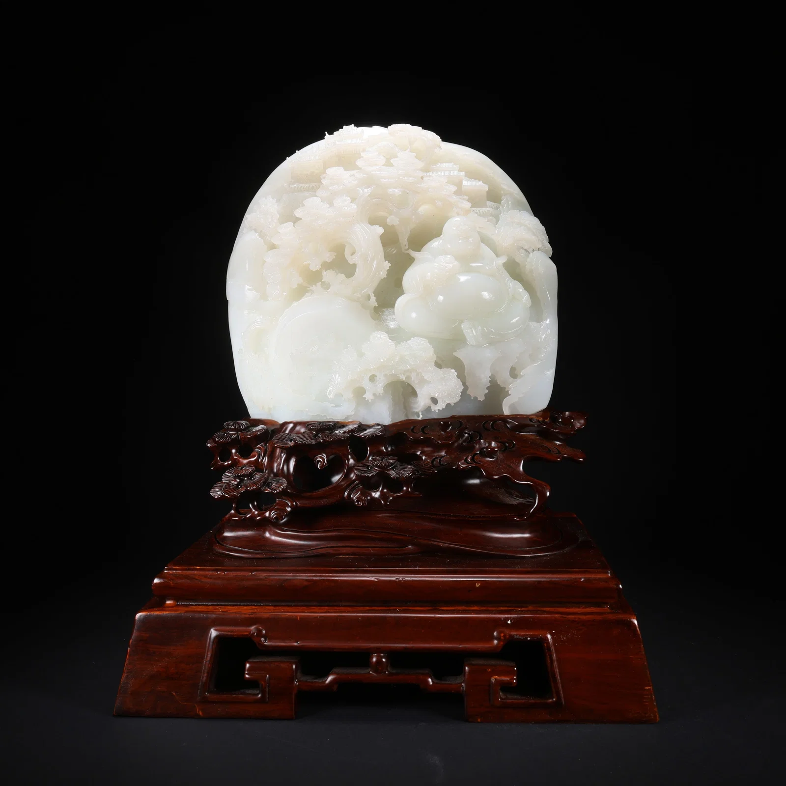 A HETIAN JADE MAITREYA HOLDING YUANBAO ON WOODEN BASE