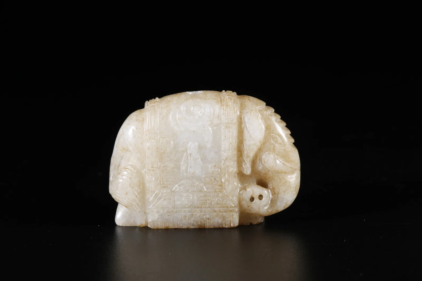 A HETIAN JADE ORNAMENT WITH "ELEPHANT OF GREAT PEACE" MOTIF