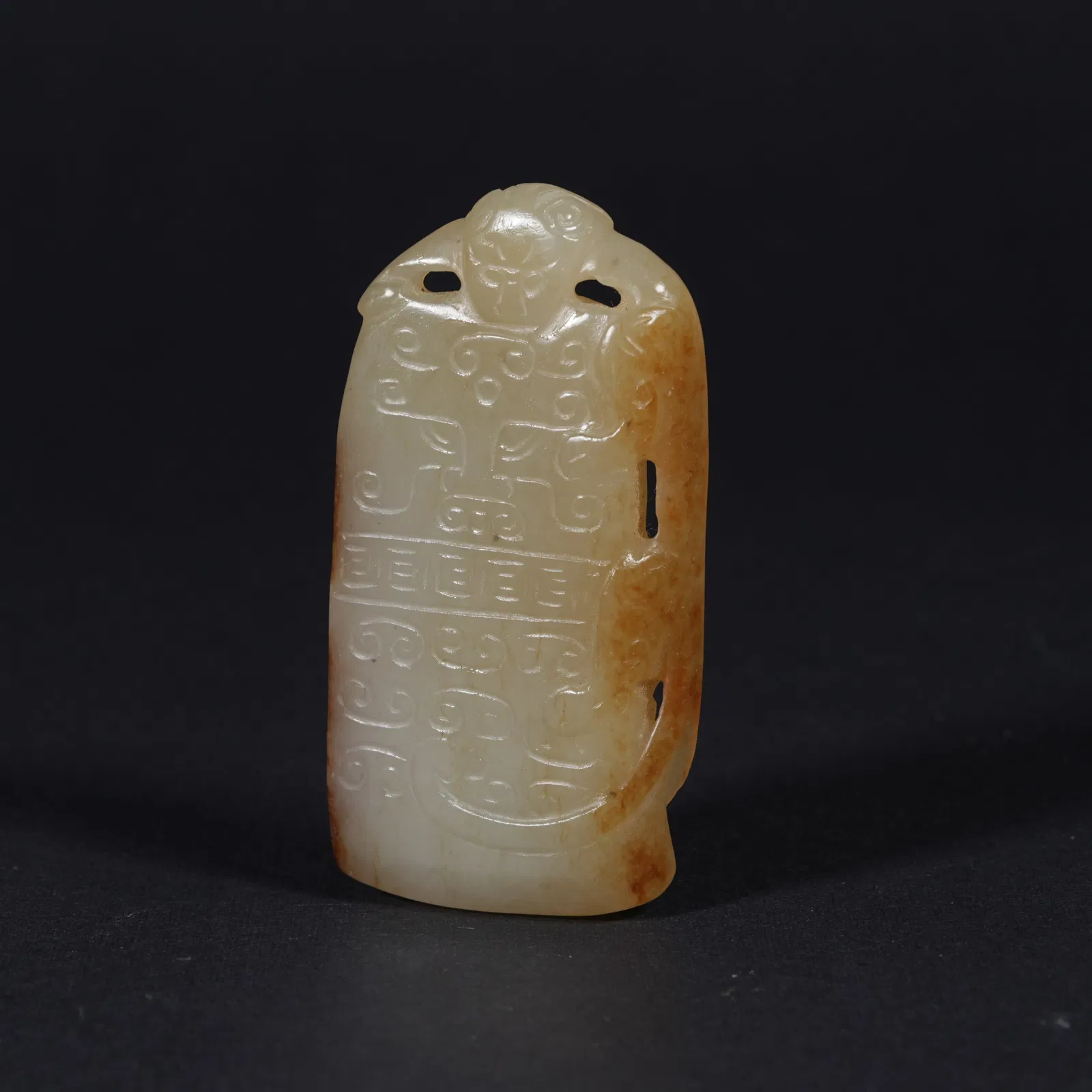 A HETIAN JADE PENDANT WITH "LONGEVITY IN THE HOUSEHOLD" MOTIF