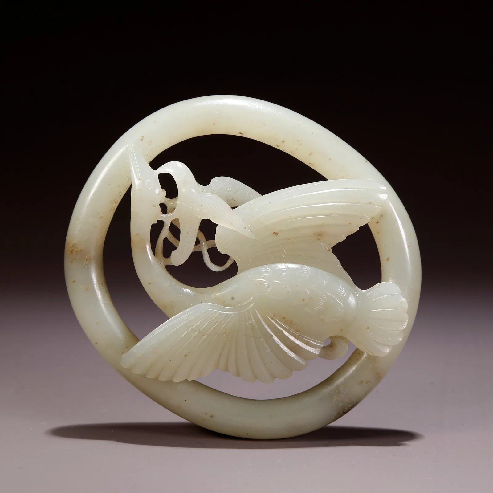 A HETIAN JADE RUDDY SHEARWATER PECKING WILD GOOSE BELT ORNAMENT