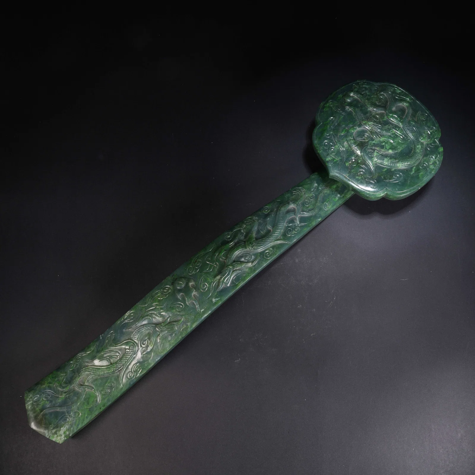 A HETIAN JADE RUYI WITH DRAGON MOTIF