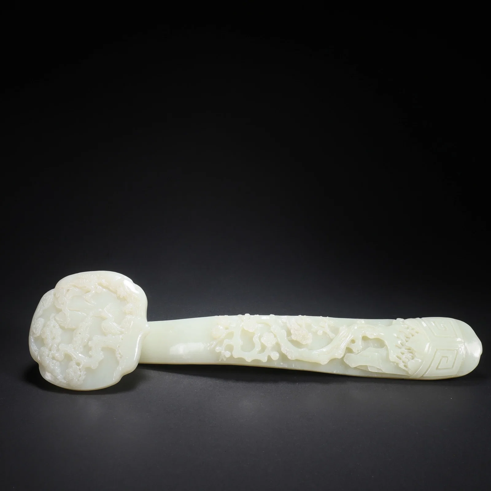 A HETIAN JADE RUYI WITH INSCRIPTION