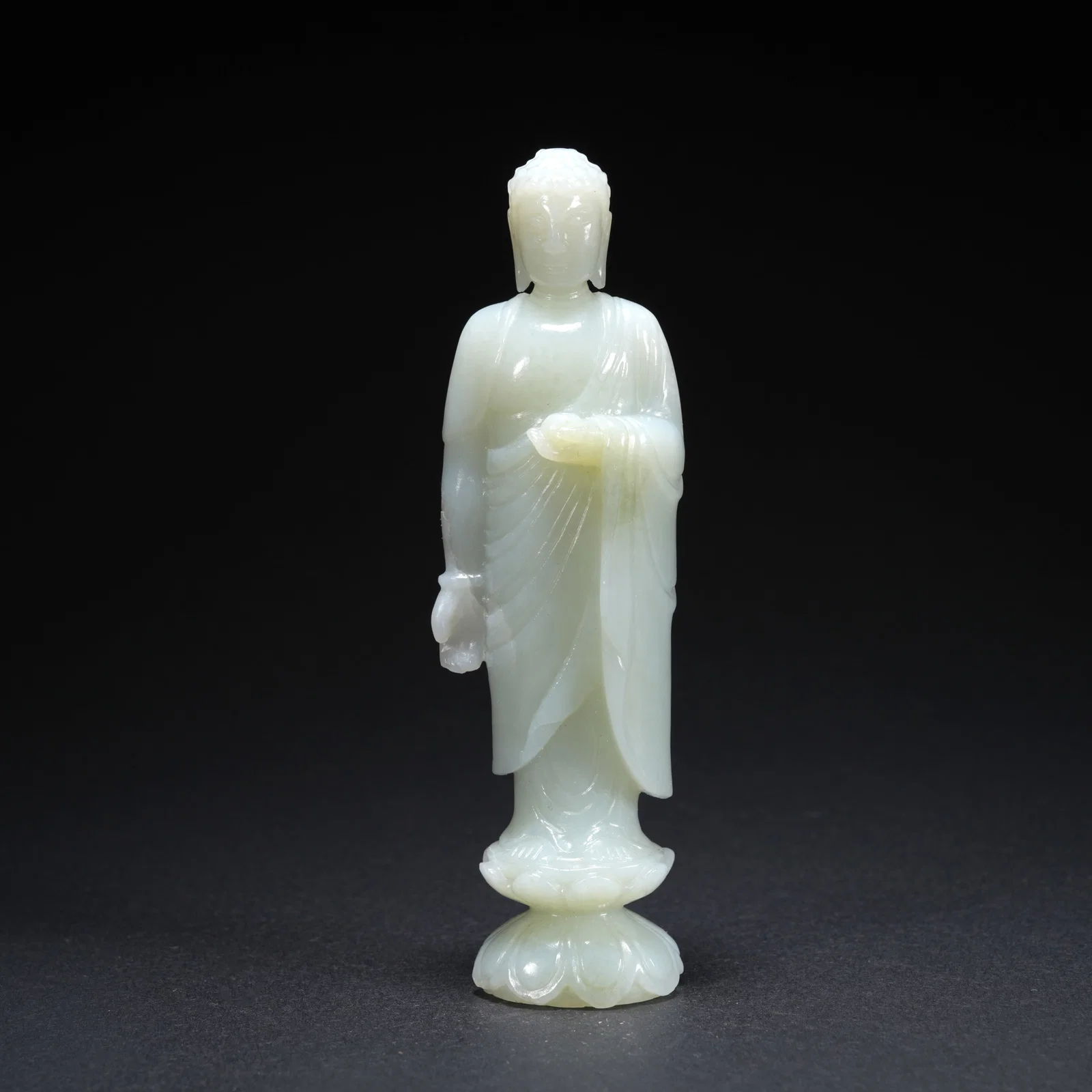 A HETIAN JADE STANDING BUDDHA STATUE