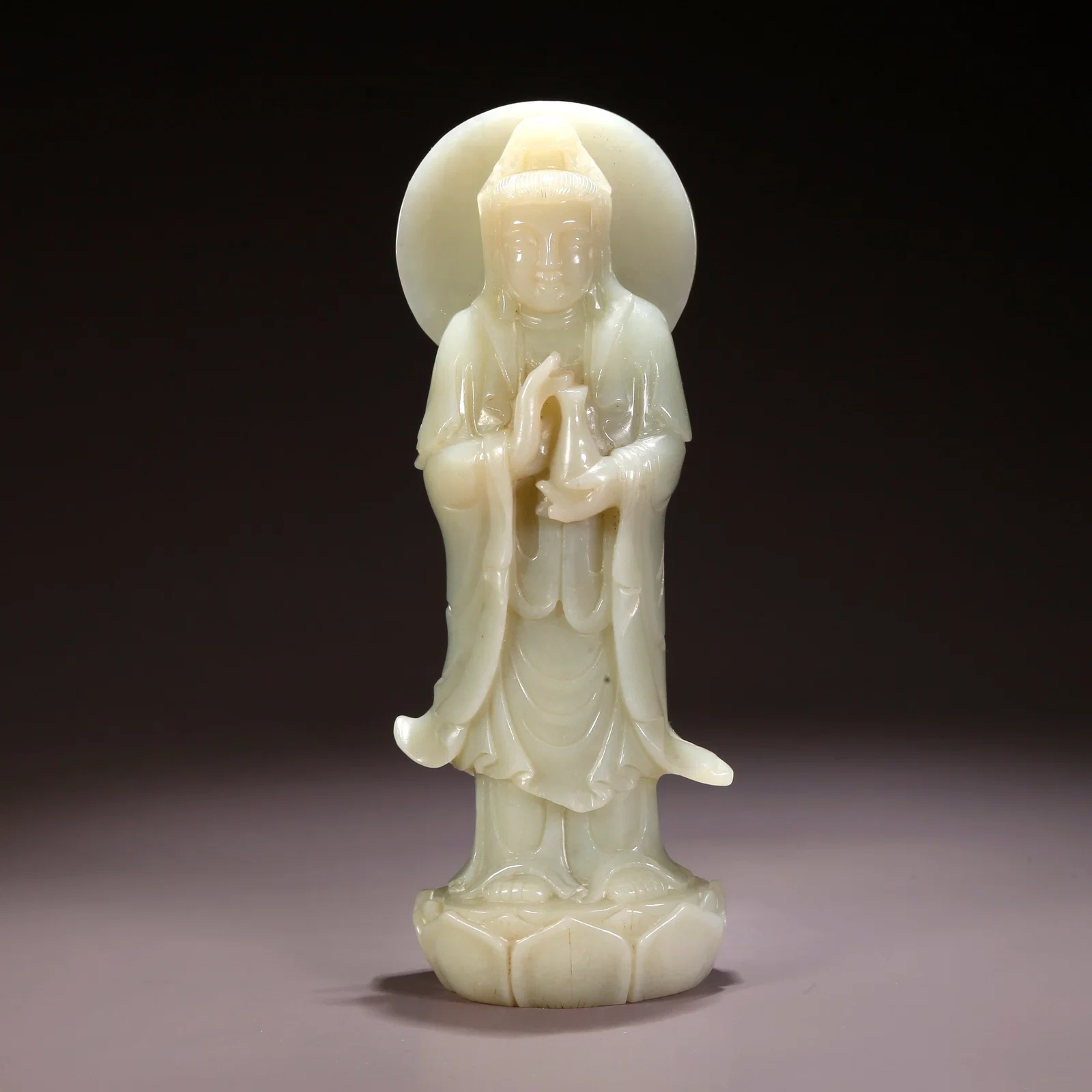 A HETIAN JADE STANDING GUANYIN FIGURE