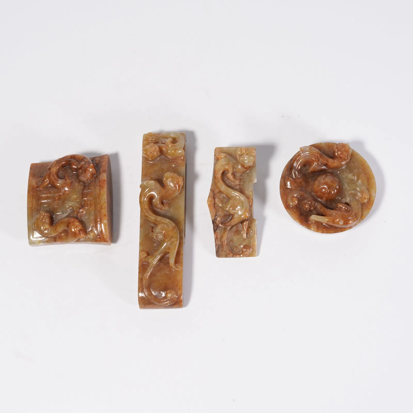 A HETIAN JADE SWORD ORNAMENT (SET)