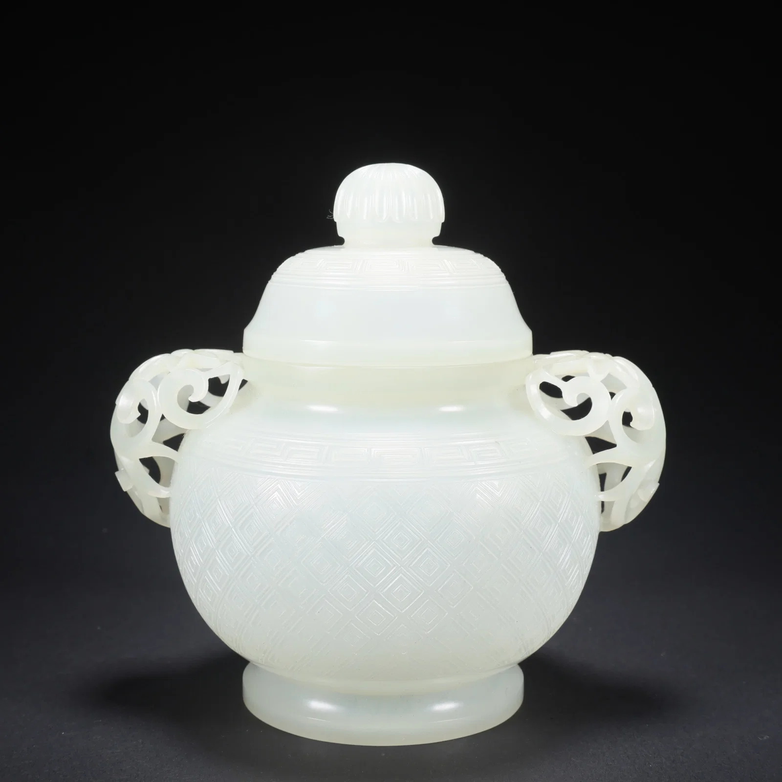 A HETIAN JADE THIN-WALLED COVERED CENSER WITH OPENWORK AND DOUBLE FLOWER HANDLES