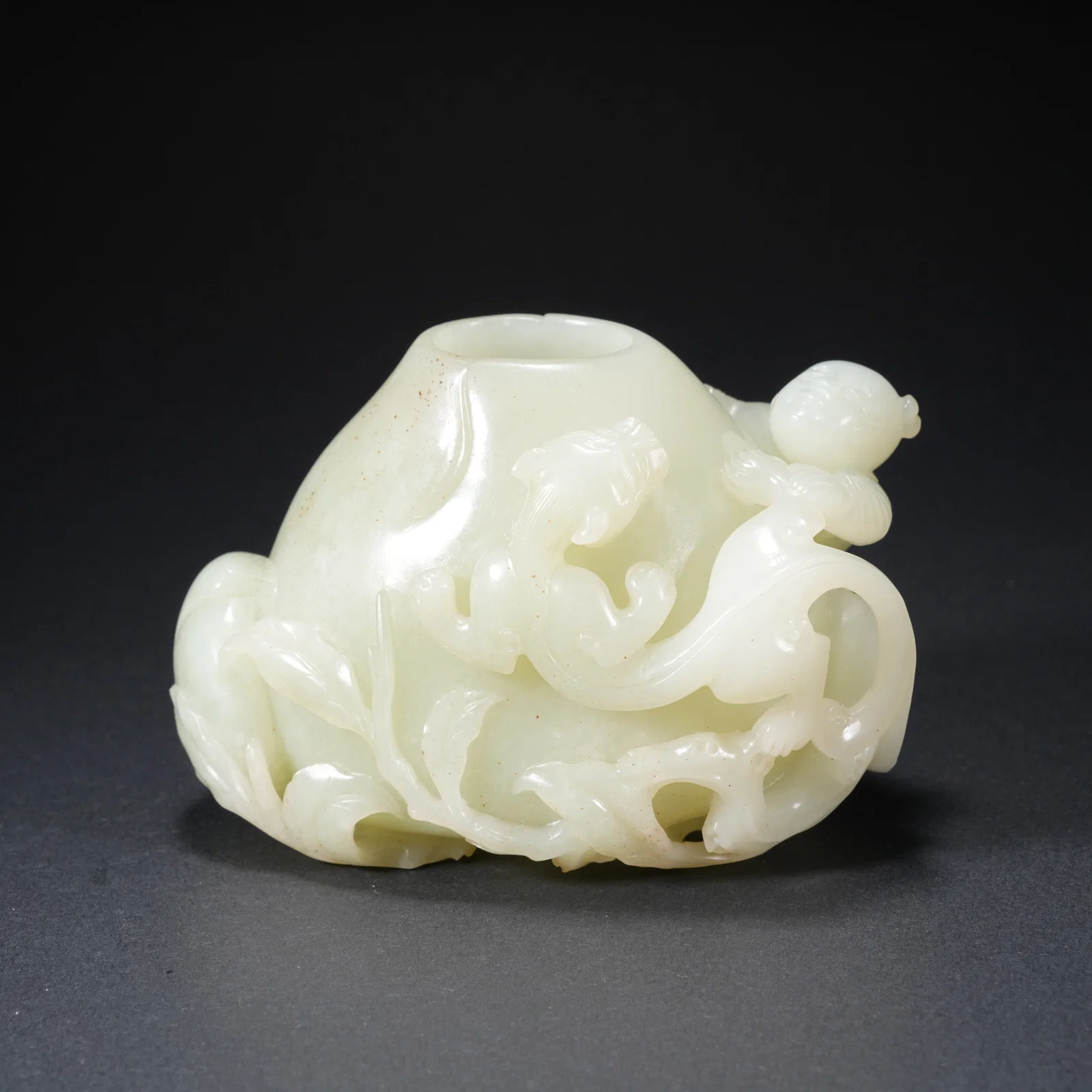 A HETIAN JADE WATER POT WITH BOY MOTIF