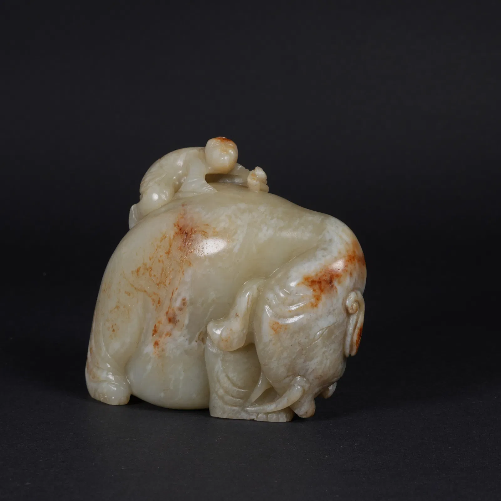 A HETIAN JADE ZOOMORPHIC FIGURINE