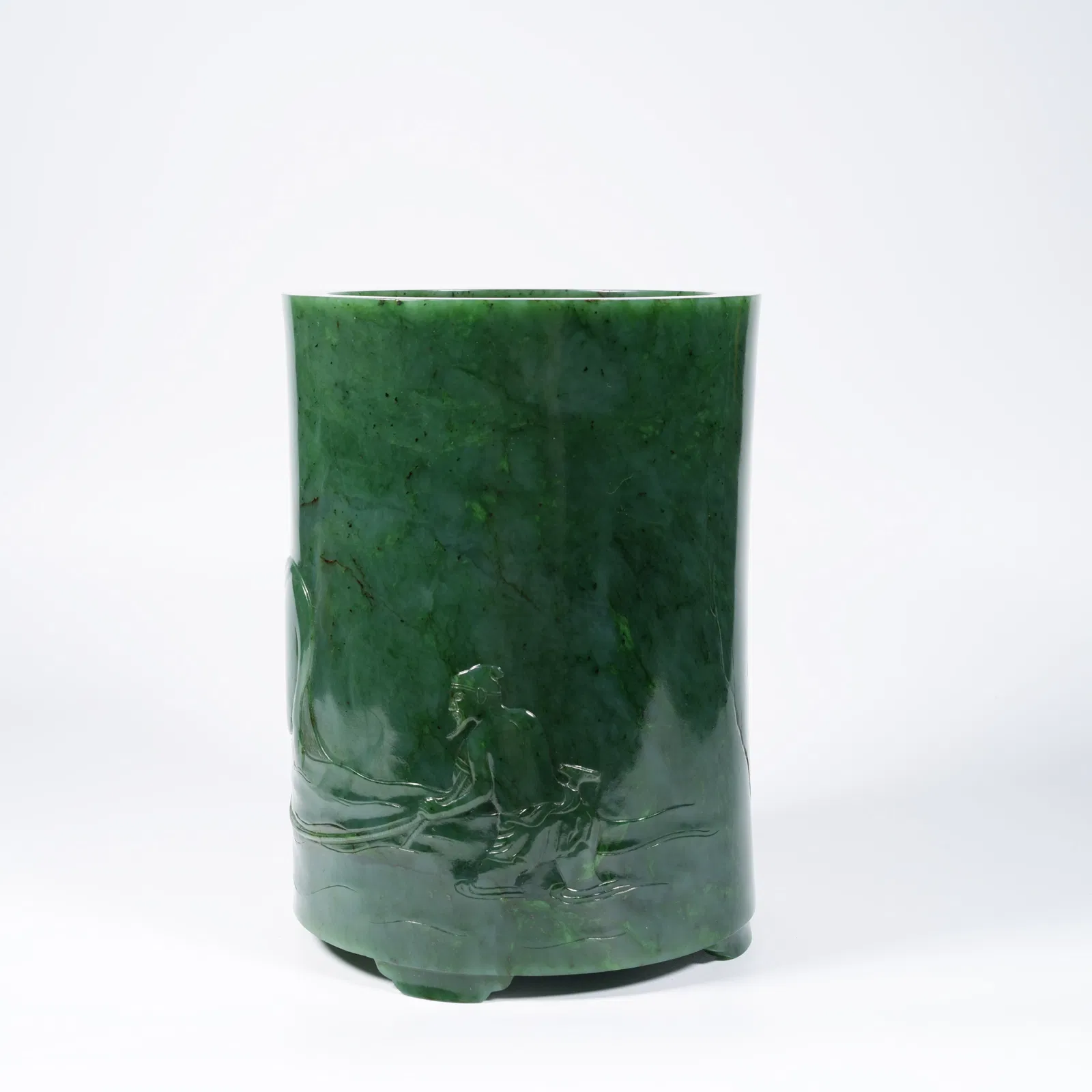 A HETIAN JASPER BRUSH POT WITH HORSE-AND-RIDER MOTIF