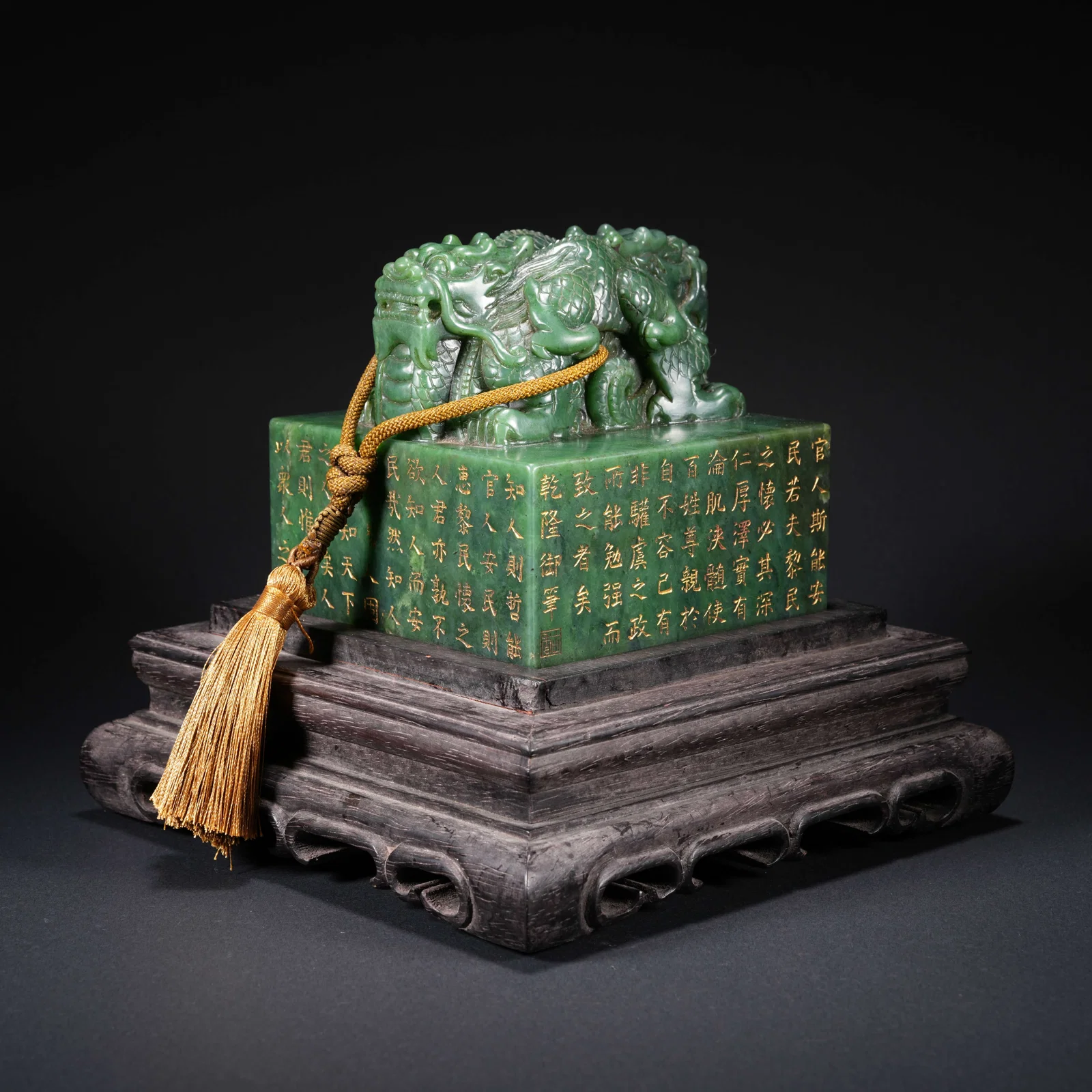 A HETIAN SPINACH GREEN JADE CARVED SEAL WITH DOUBLE-DRAGON FINIAL, GILT DECORATION AND POEM