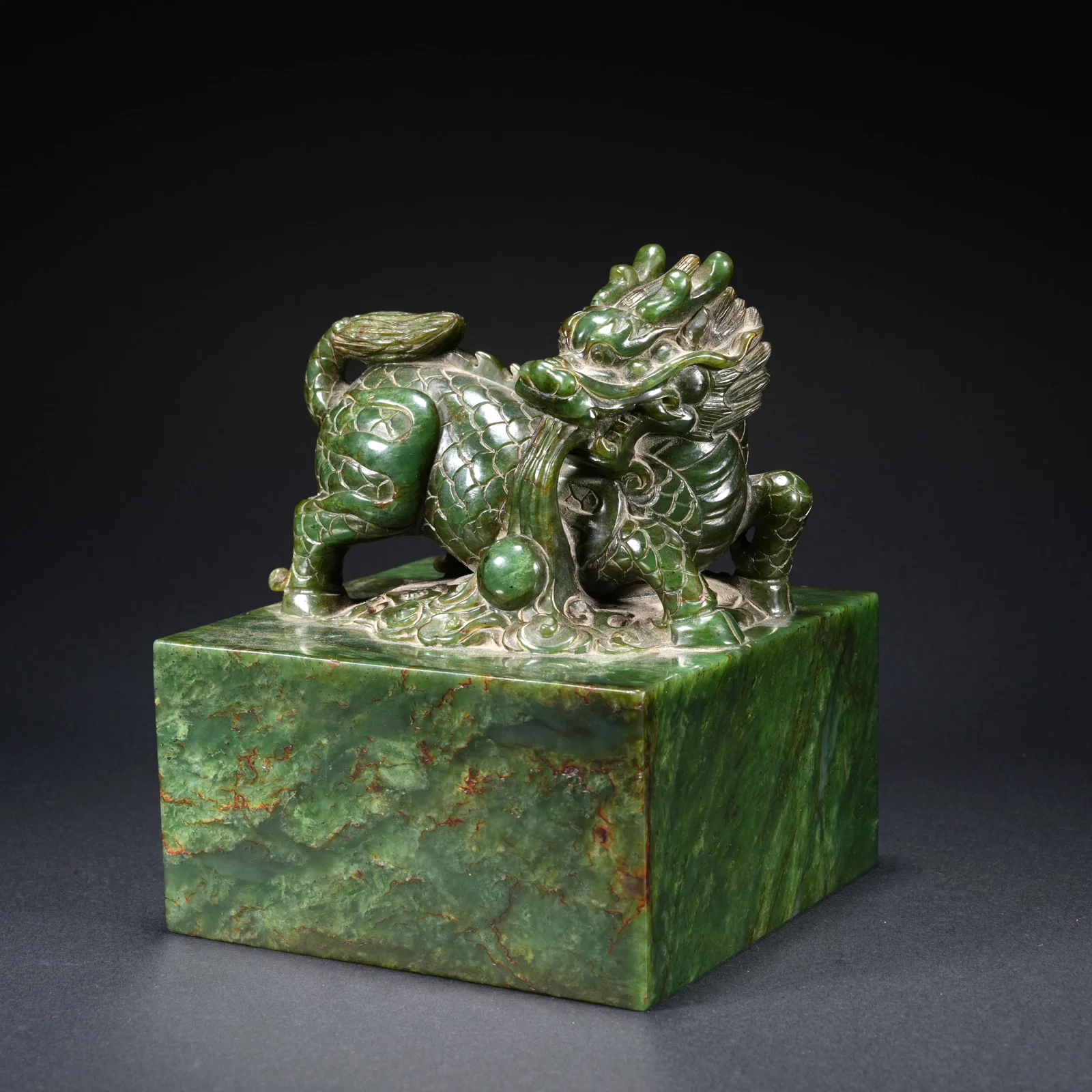 A HETIAN SPINACH GREEN JADE CARVED SEAL WITH QILIN FINIAL