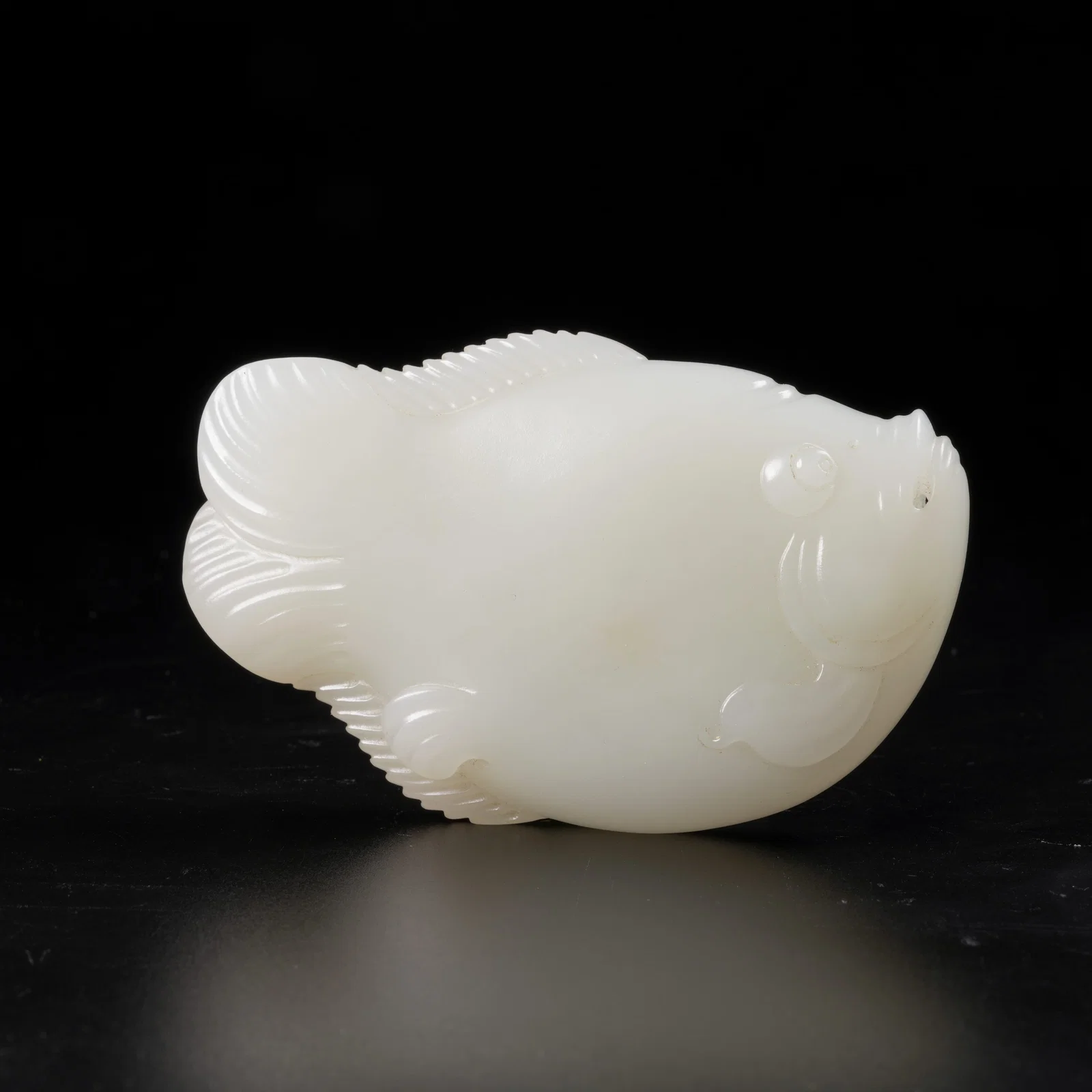 A HETIAN WHITE JADE FISH PENDANT